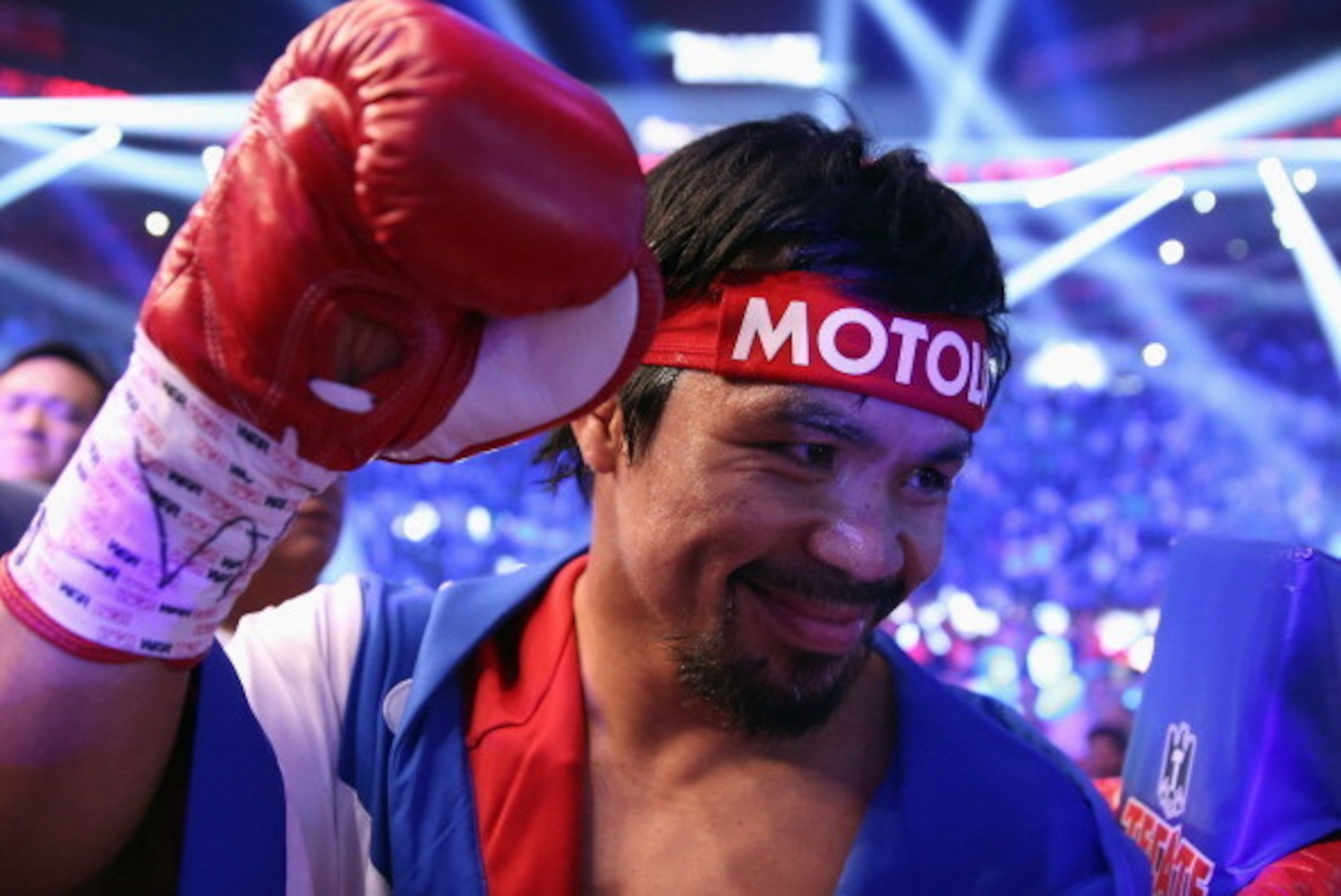 LAS VEGAS, NV - APRIL 12:  Manny Pacquiao acknowledges people in the crowd prior to fighting Timothy Bradley at the MGM Grand Garden Arena on April 12, 2014 in Las Vegas, Nevada.  (Photo by Jeff Gross/Getty Images)