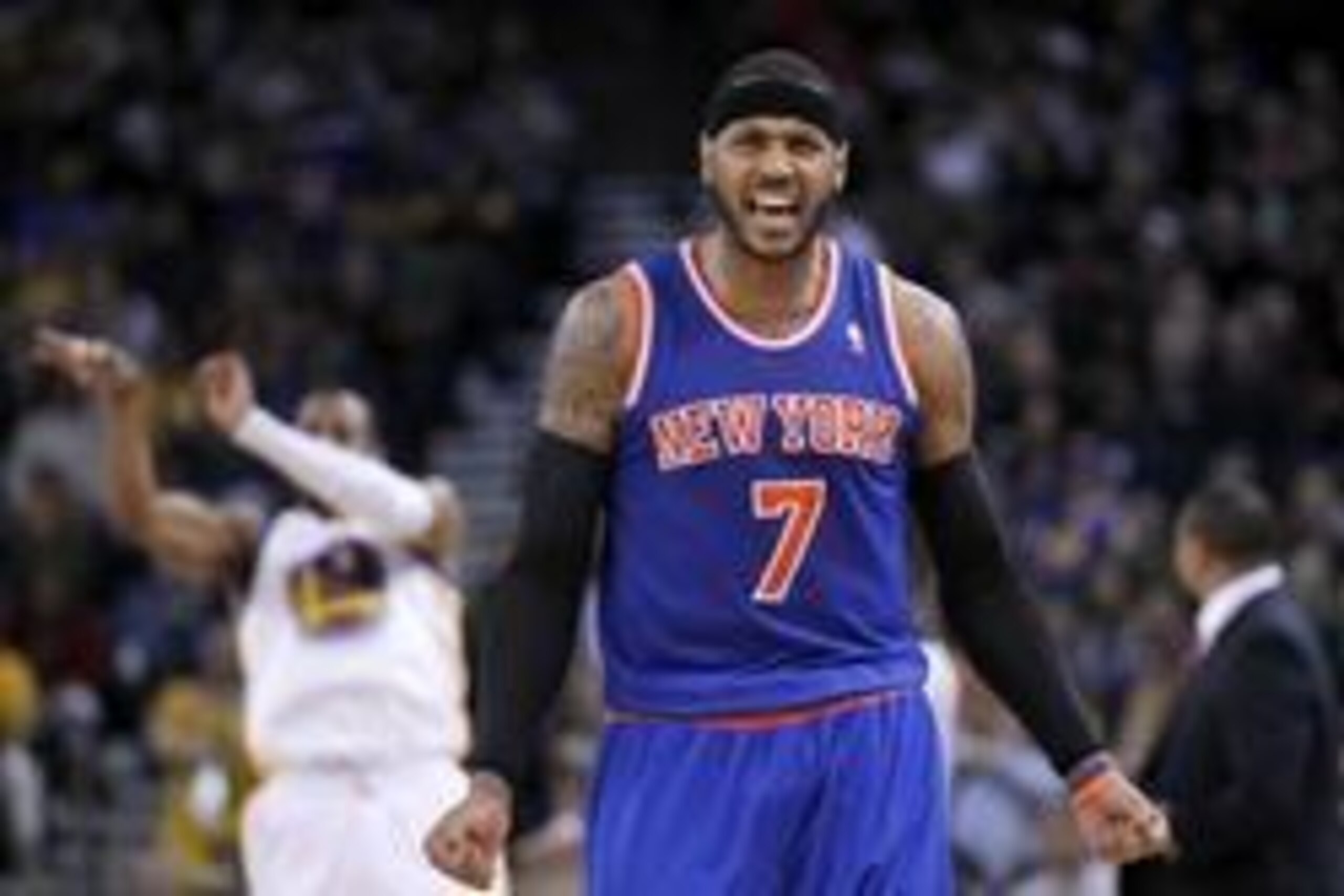 Mar 30, 2014; Oakland, CA, USA; New York Knicks forward Carmelo Anthony (7) reacts on the court against the Golden State Warriors in the fourth quarter at Oracle Arena. The Knicks won 89-84. Mandatory Credit: Cary Edmondson-USA TODAY Sports