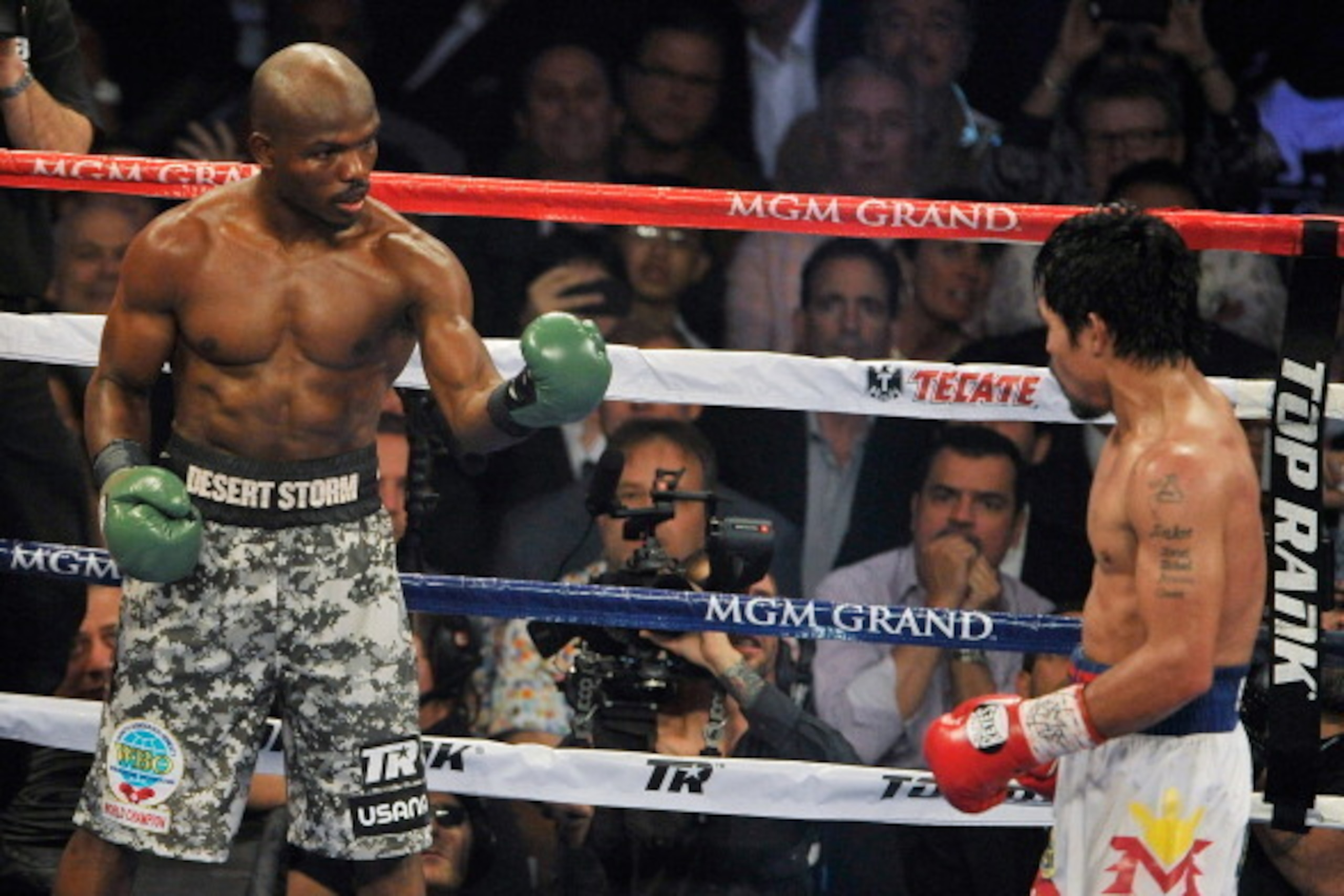 LAS VEGAS, NV - APRIL 12:  Timothy Bradley (L) taunts Manny Pacquiao during their WBO world welterweight championship boxing match at the MGM Grand Garden Arena on April 12, 2014 in Las Vegas, Nevada. Pacquiao won by unanimous decision.  (Photo by David B