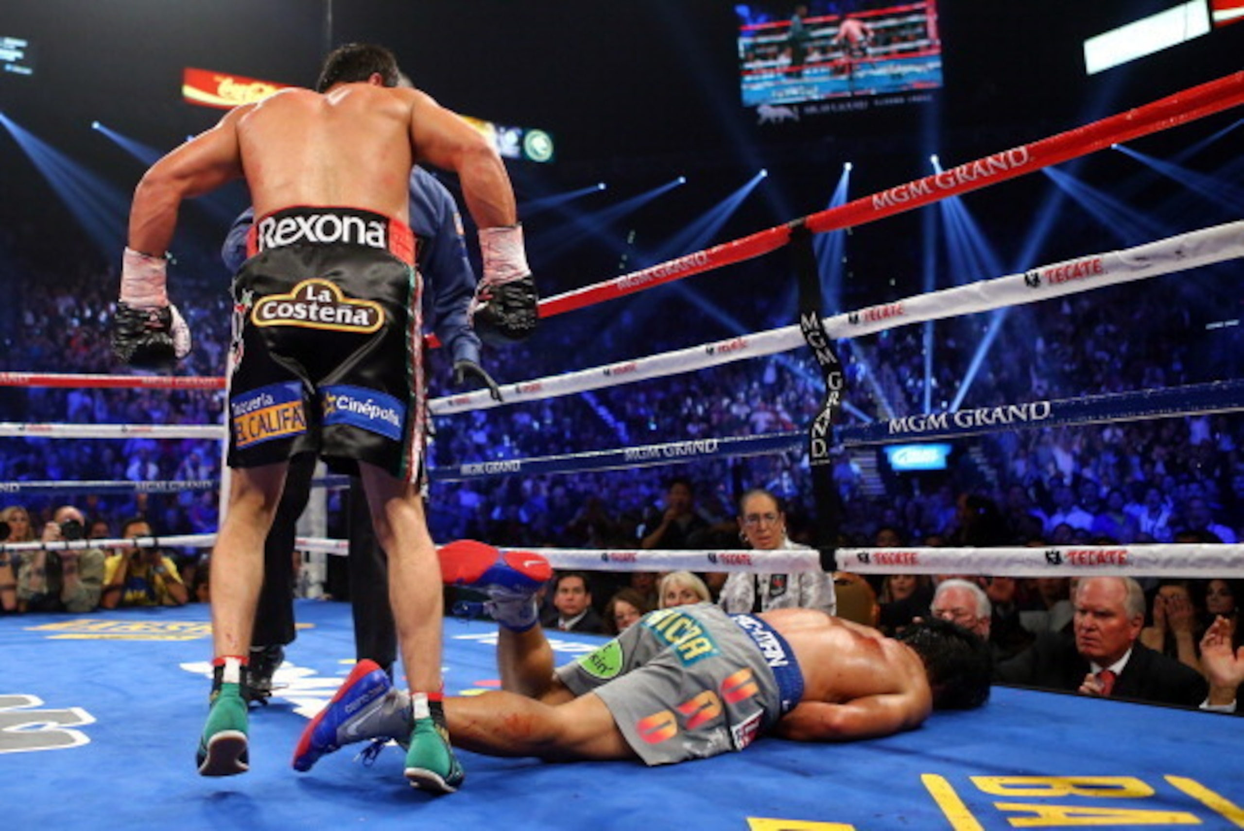 LAS VEGAS, NV - DECEMBER 08:  Manny Pacquiao lays face down on the mat after being knocked out in the sixth round by Juan Manuel Marquez during their welterweight bout at the MGM Grand Garden Arena on December 8, 2012 in Las Vegas, Nevada.  (Photo by Al B