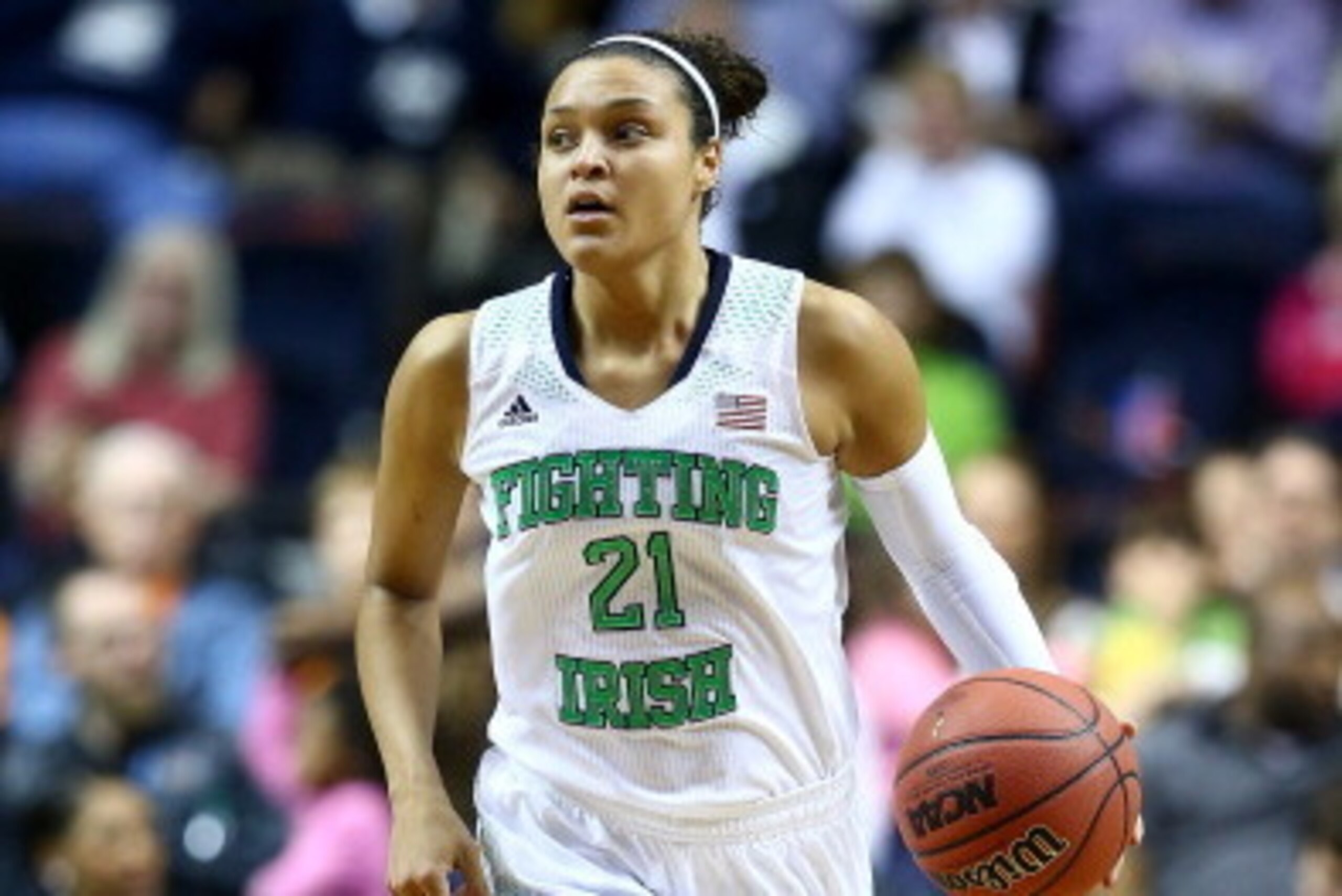 NASHVILLE, TN - APRIL 06:  Kayla McBride #21 of the Notre Dame Fighting Irish handles the ball in the second half against the Maryland Terrapins during the NCAA Women's Final Four semifinal at Bridgestone Arena on April 6, 2014 in Nashville, Tennessee.  (