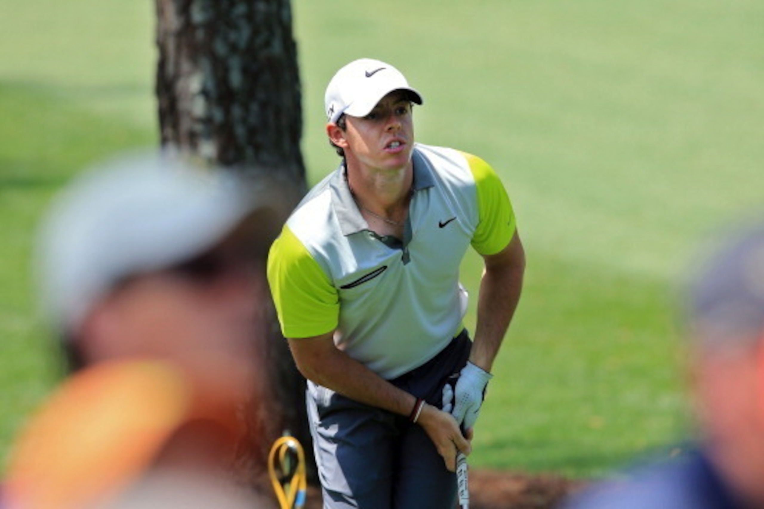 AUGUSTA, GA - APRIL 13:  Rory McIlroy of Northern Ireland watches a shot from the rough during the final round of the 2014 Masters Tournament at Augusta National Golf Club on April 13, 2014 in Augusta, Georgia.  (Photo by David Cannon/Getty Images)
