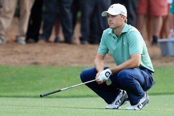 AUGUSTA, GA - APRIL 13:  Jordan Spieth of the United States reacts to a poor shot on the 14th hole during the final round of the 2014 Masters Tournament at Augusta National Golf Club on April 13, 2014 in Augusta, Georgia.  (Photo by David Cannon/Getty Ima