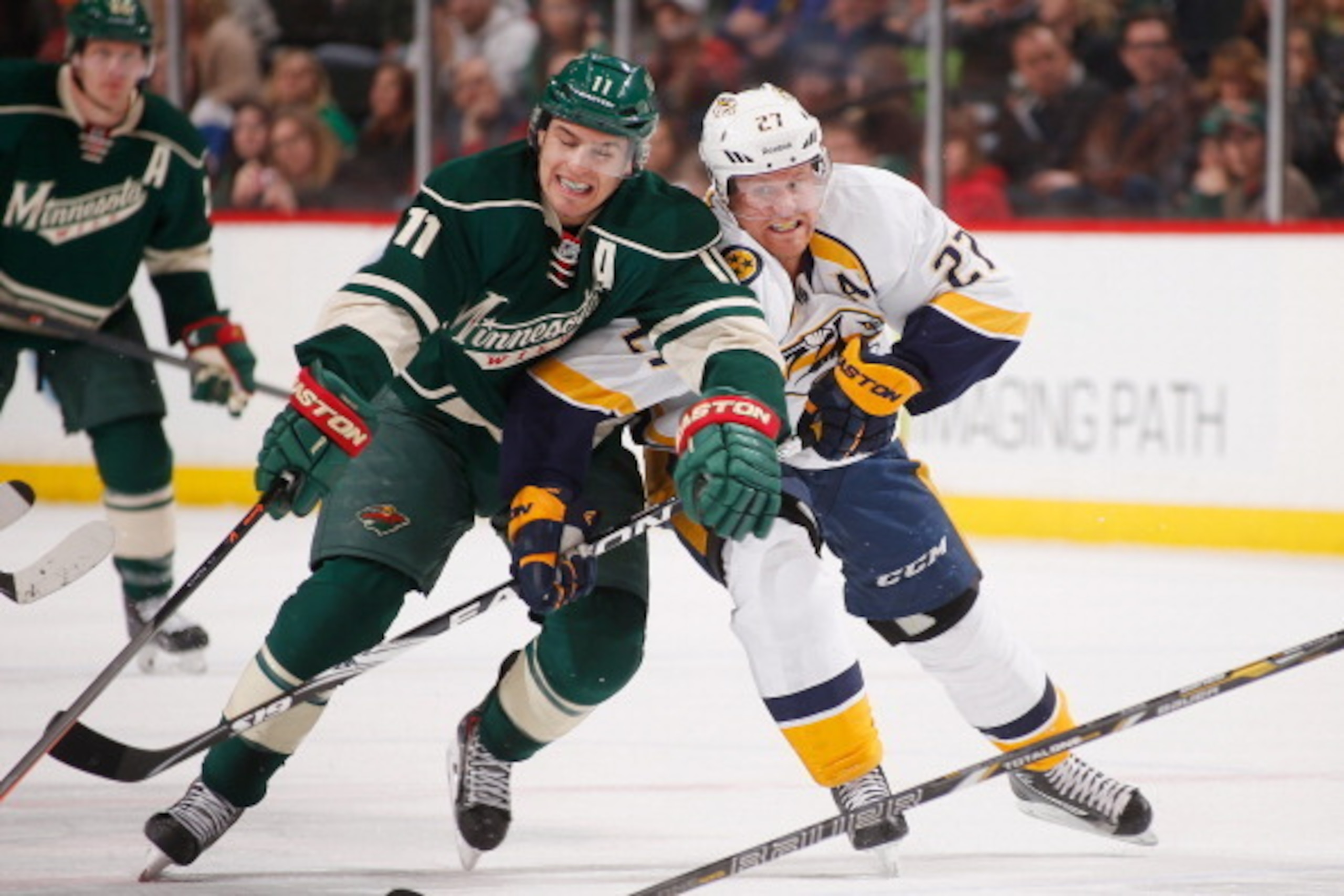 ST. PAUL, MN - APRIL 13: Zach Parise #11 of the Minnesota Wild and Patric Hornqvist #27 of the Nashville Predators skate to the puck during the game on April 13, 2014 at the Xcel Energy Center in St. Paul, Minnesota. (Photo by Bruce Kluckhohn/NHLI via Get ST. PAUL, MN - APRIL 13: Zach Parise #11 of the Minnesota Wild and Patric Hornqvist #27 of the Nashville Predators skate to the puck during the game on April 13, 2014 at the Xcel Energy Center in St. Paul, Minnesota. (Photo by Bruce Kluckhohn/NHLI via Get