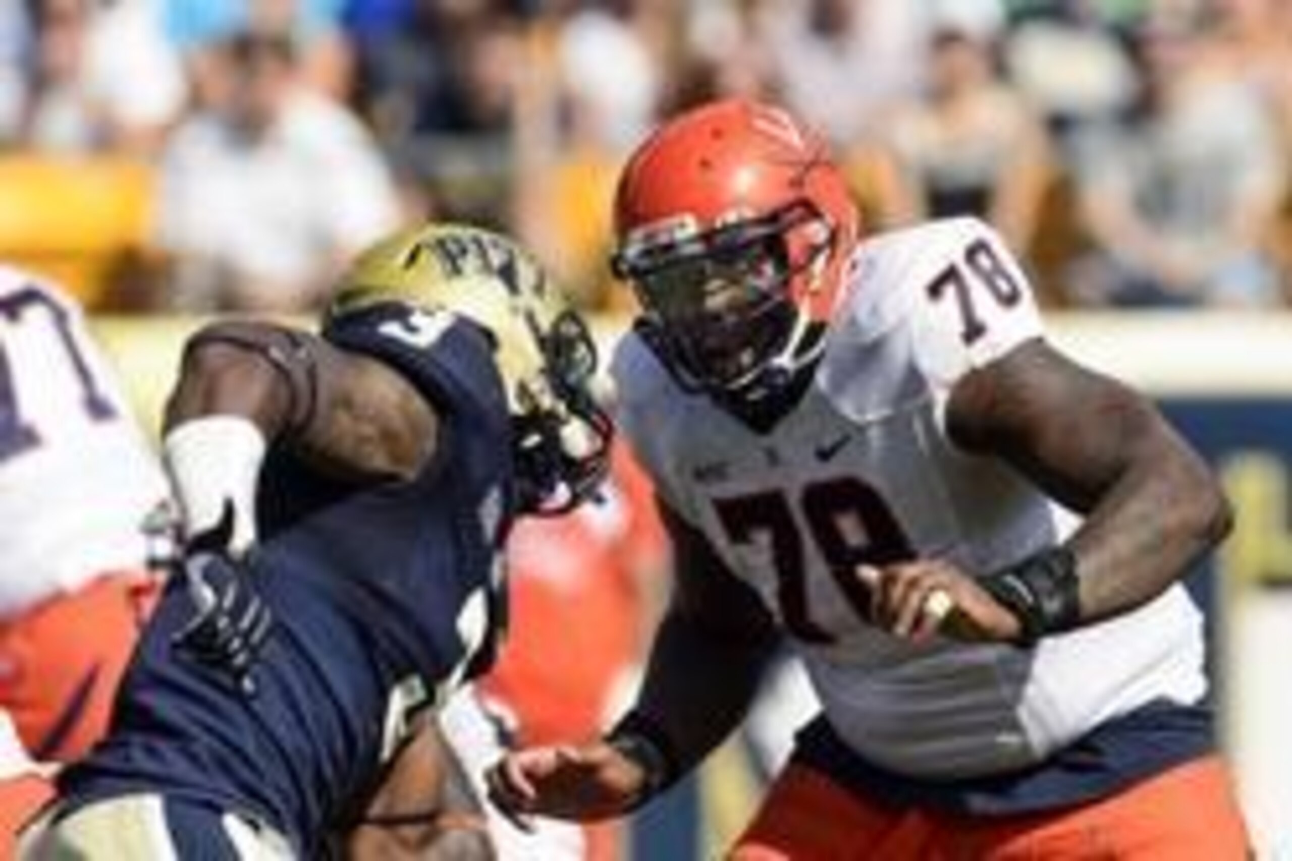 Sep 28, 2013; Pittsburgh, PA, USA; Virginia Cavaliers offensive tackle Morgan Moses (78) blocks Pittsburgh Panthers linebacker Nicholas Grigsby (3) during the third quarter at Heinz Field. Pittsburgh defeated Virginia 14-3. Mandatory Credit: Howard Smith-