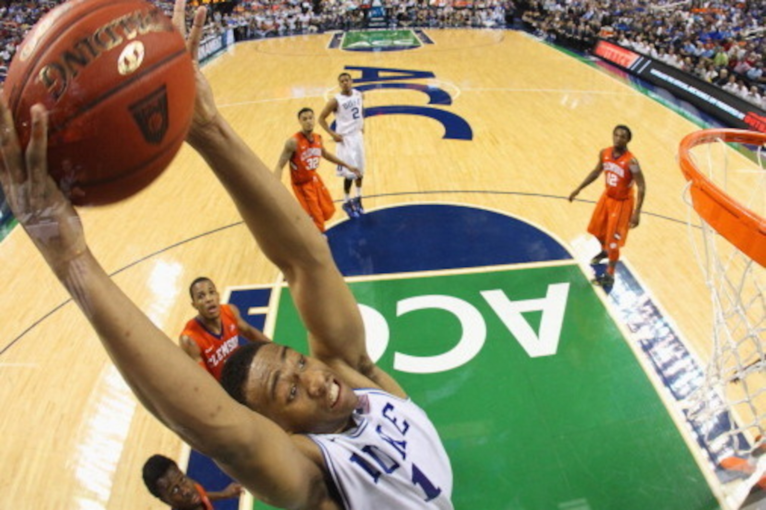 GREENSBORO, NC - MARCH 14:  Jabari Parker #1 of the Duke Blue Devils dunks the ball against the Clemson Tigers during the quarterfinals of the 2014 Men's ACC Basketball Tournament at Greensboro Coliseum on March 14, 2014 in Greensboro, North Carolina.  (P