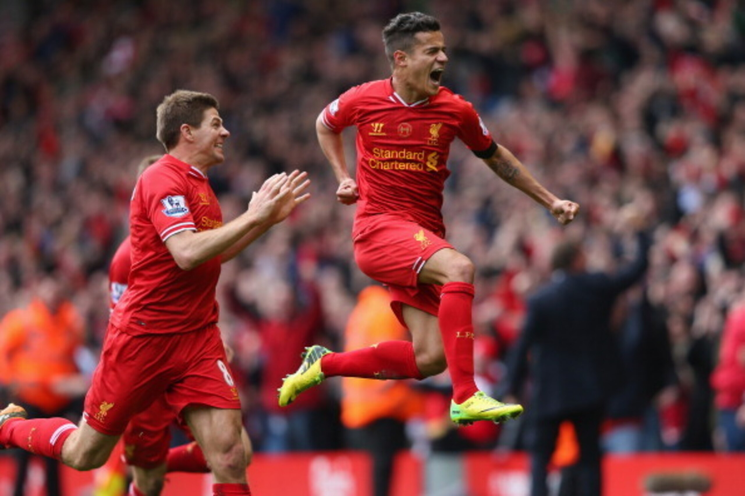 LIVERPOOL, ENGLAND - APRIL 13: Philippe Coutinho of Liverpool celebrates scoring his team's third goal during the Barclays Premier League match between Liverpool and Manchester City at Anfield on April 13, 2014 in Liverpool, England. (Photo by Alex Live LIVERPOOL, ENGLAND - APRIL 13: Philippe Coutinho of Liverpool celebrates scoring his team's third goal during the Barclays Premier League match between Liverpool and Manchester City at Anfield on April 13, 2014 in Liverpool, England. (Photo by Alex Live