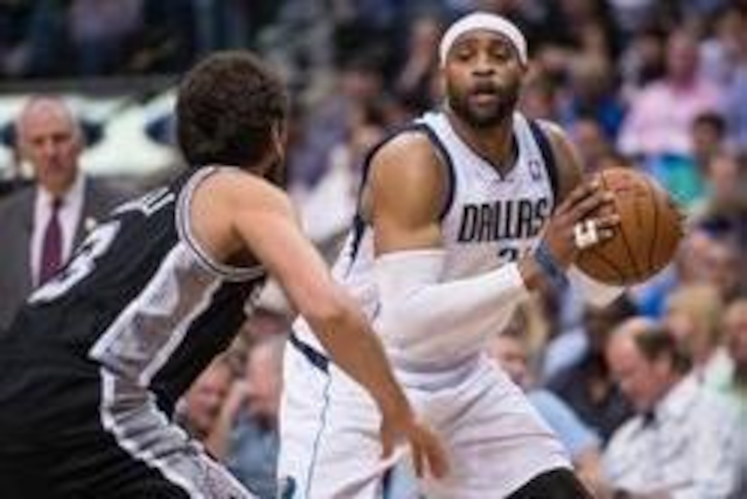 Apr 10, 2014; Dallas, TX, USA; San Antonio Spurs guard Marco Belinelli (3) guards Dallas Mavericks guard Vince Carter (25) during the first half at the American Airlines Center. Mandatory Credit: Jerome Miron-USA TODAY Sports
