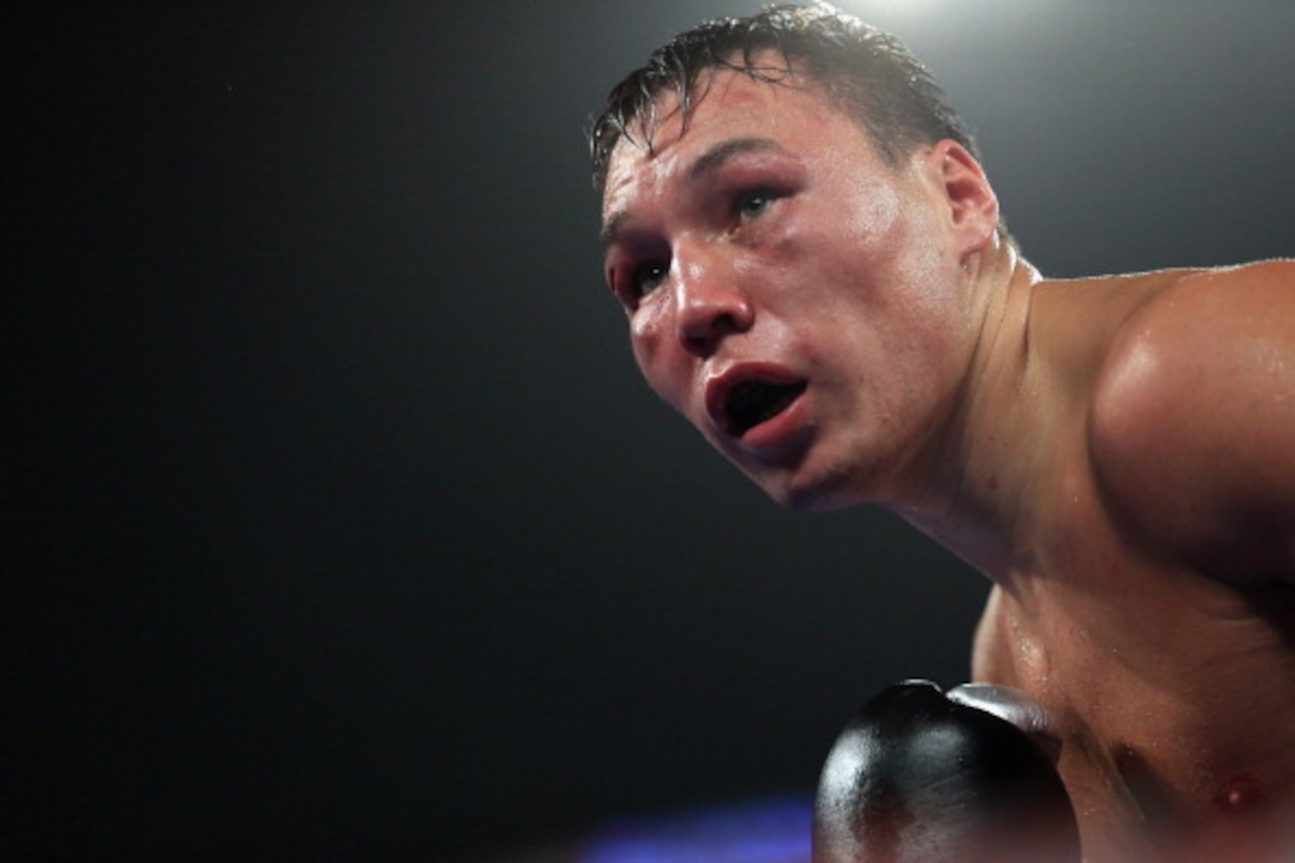 BROOMFIELD, CO - OCTOBER 19:  Ruslan Provodnikov of Russia works against Mike Alvarado as Provodnikov won their bout with a TKO in the 10th round to claim the WBO Junior Welterweight Title at the 1stBank Center on October 19, 2013 in Broomfield, Colorado.