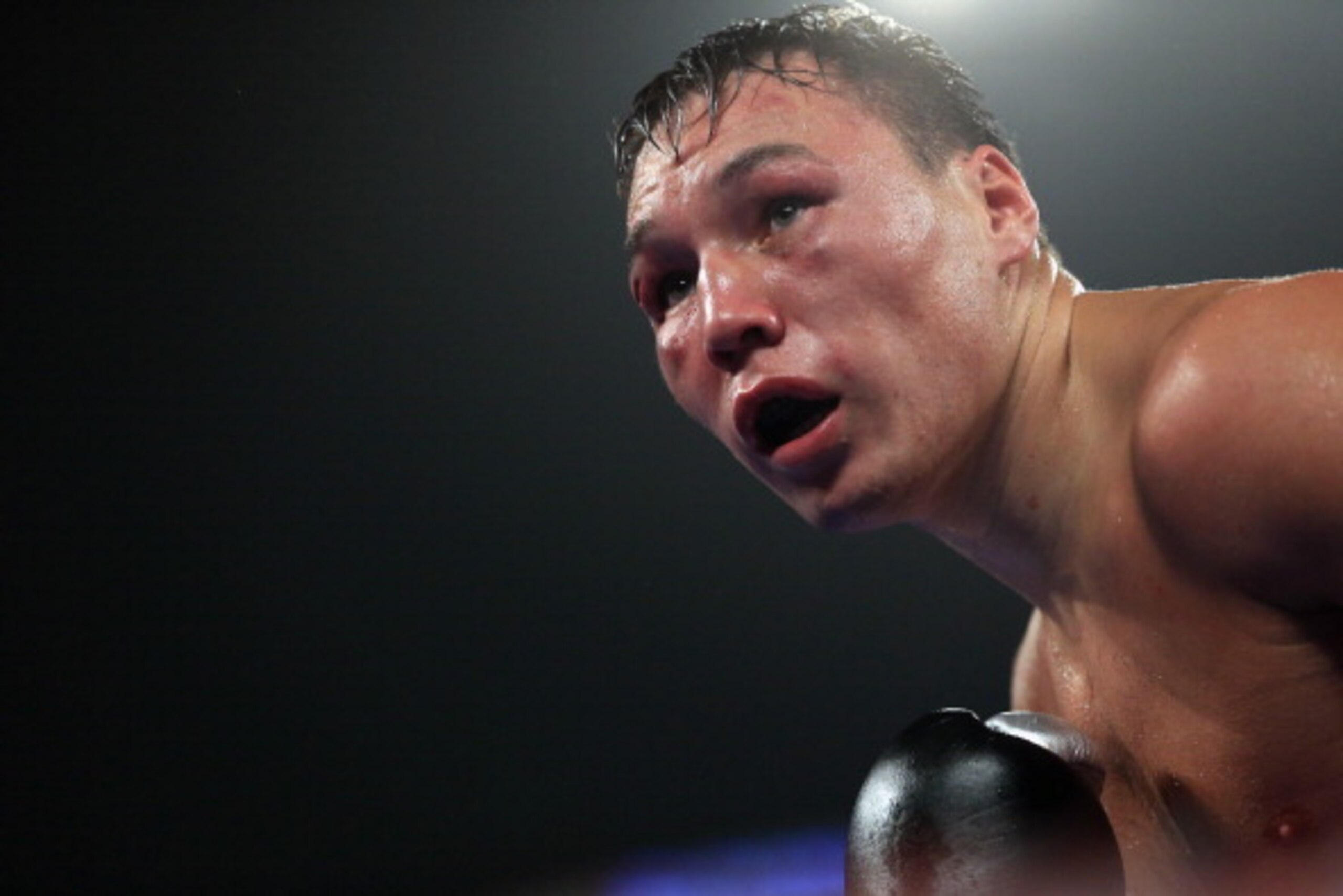BROOMFIELD, CO - OCTOBER 19:  Ruslan Provodnikov of Russia works against Mike Alvarado as Provodnikov won their bout with a TKO in the 10th round to claim the WBO Junior Welterweight Title at the 1stBank Center on October 19, 2013 in Broomfield, Colorado.