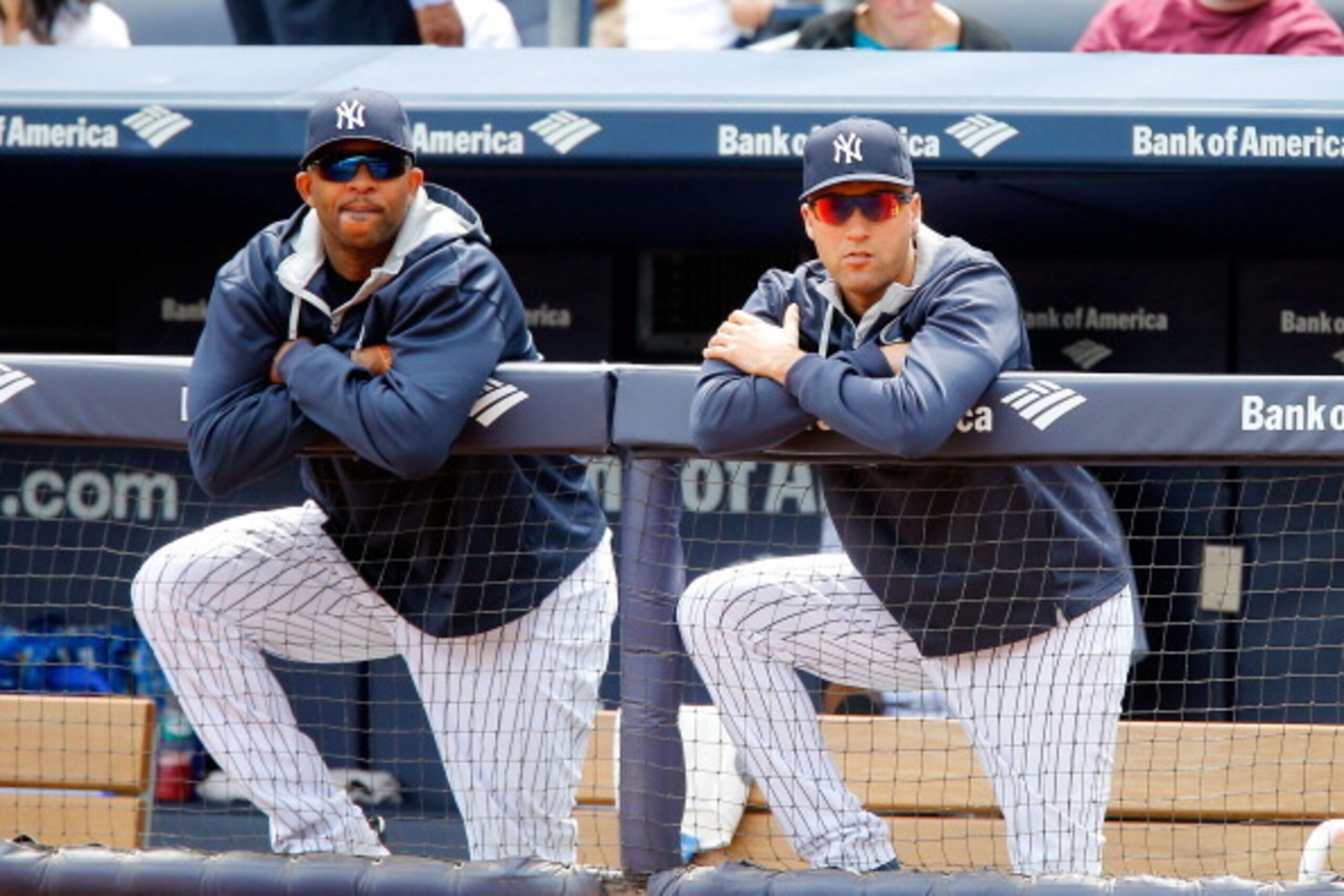 NEW YORK, NY - APRIL 12: Derek Jeter #2 (R) and CC Sabathia #52 of the New York Yankees looks on from the dugout during the first inning against the Boston Red Sox at Yankee Stadium on April 12, 2014 in the Bronx borough of New York City. (Photo by Jim NEW YORK, NY - APRIL 12: Derek Jeter #2 (R) and CC Sabathia #52 of the New York Yankees looks on from the dugout during the first inning against the Boston Red Sox at Yankee Stadium on April 12, 2014 in the Bronx borough of New York City. (Photo by Jim