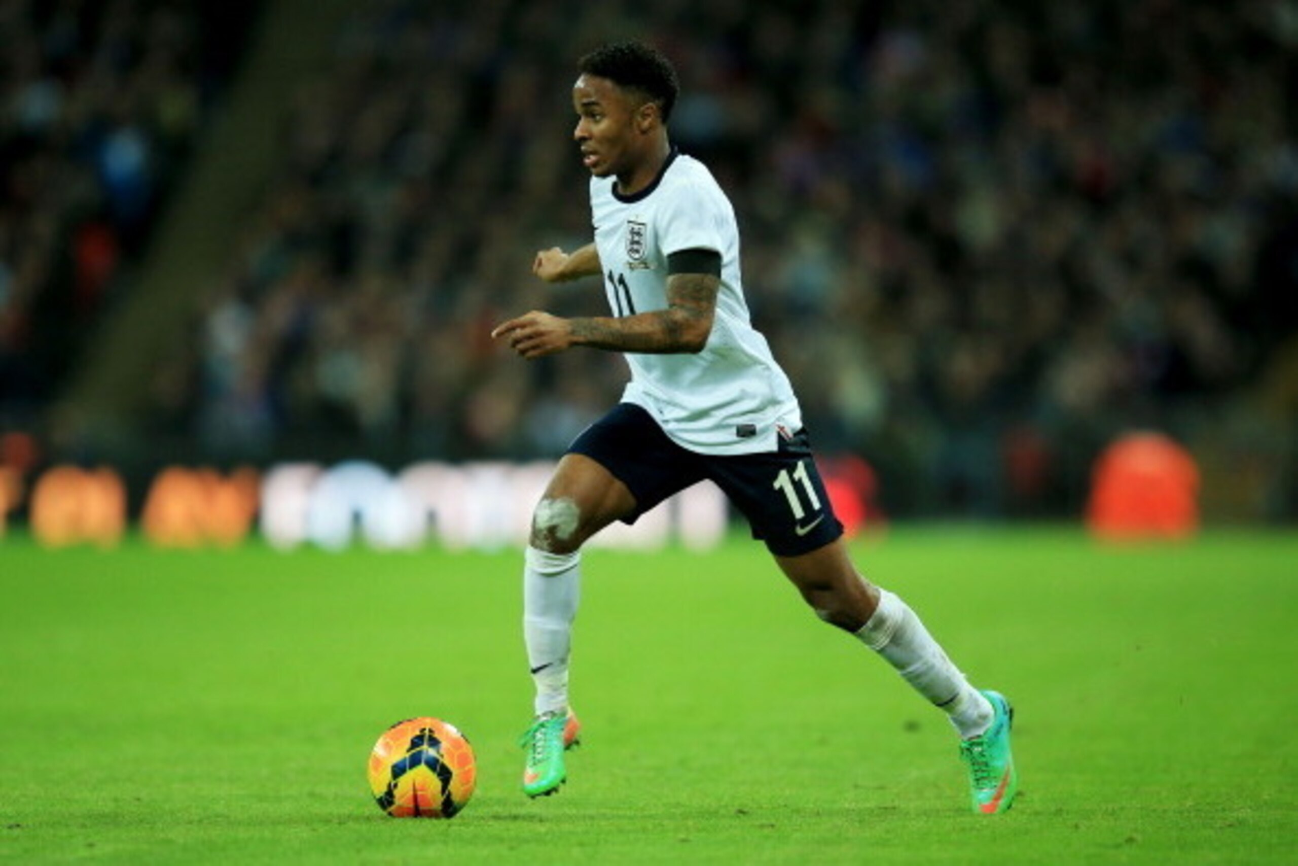 LONDON, ENGLAND - MARCH 05:  Raheem Sterling of England in action during the International Friendly match between England and Denmark at Wembley Stadium on March 5, 2014 in London, England.  (Photo by Richard Heathcote/Getty Images)