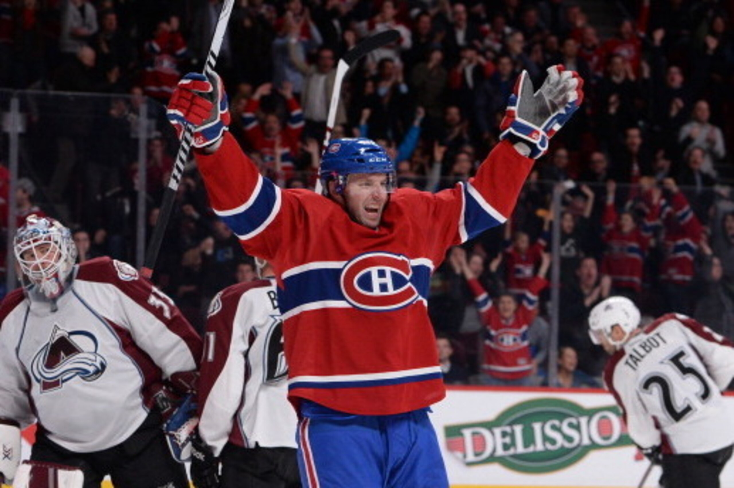 MONTREAL, CANADA - MARCH 18: Thomas Vanek #20 of the Montreal Canadiens celebrates after scoring a goal against the Colorado Avalanche during the NHL game on March 18, 2014 at the Bell Centre in Montreal, Quebec, Canada. (Photo by Francois Lacasse/NHLI vi