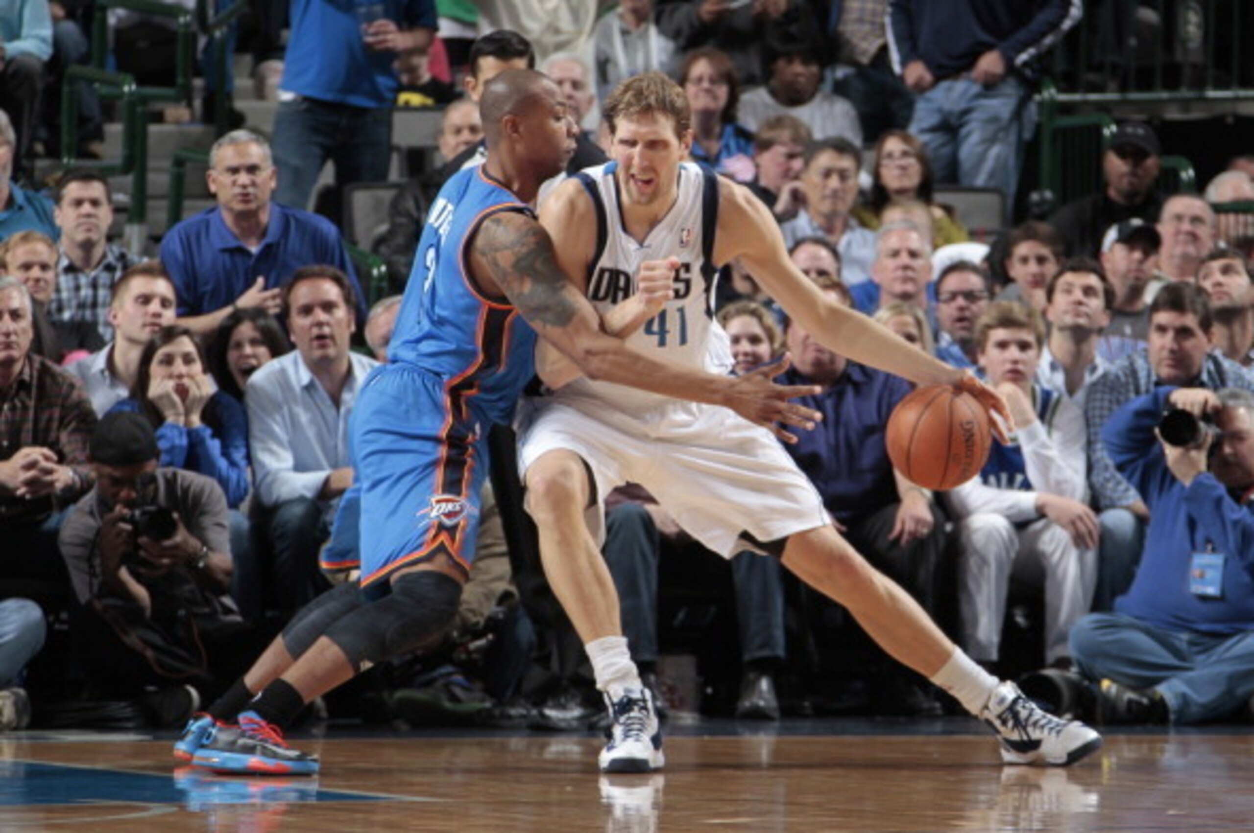 DALLAS, TX - MARCH 25: Dirk Nowitzki #41 of the Dallas Mavericks drives against the Oklahoma City Thunder on March 25, 2014 at the American Airlines Center in Dallas, Texas. NOTE TO USER: User expressly acknowledges and agrees that, by downloading and or 