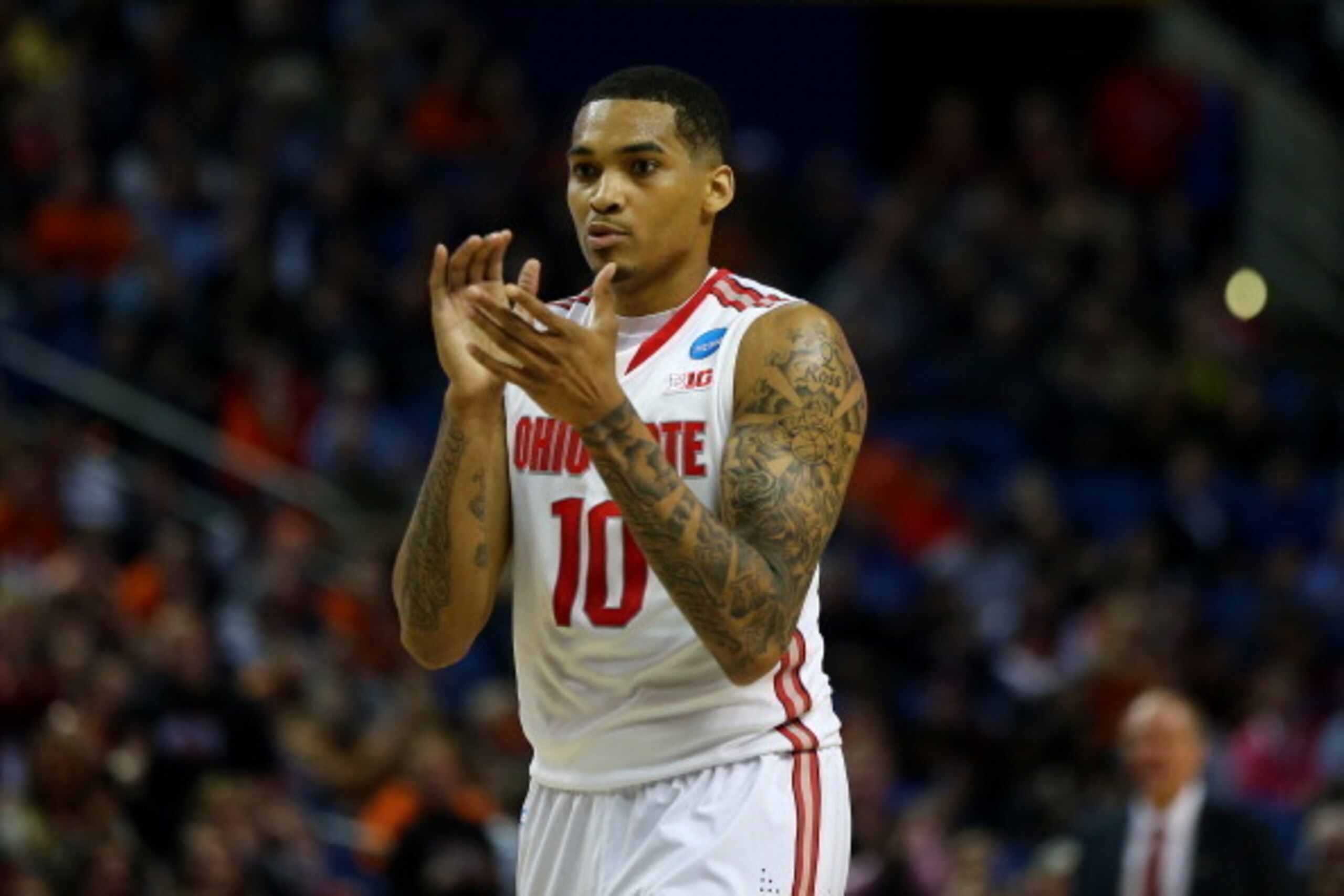 BUFFALO, NY - MARCH 20: LaQuinton Ross #10 of the Ohio State Buckeyes reacts after a foul is called against the Dayton Flyers during the second round of the 2014 NCAA Men's Basketball Tournament at the First Niagara Center on March 20, 2014 in Buffalo, Ne BUFFALO, NY - MARCH 20: LaQuinton Ross #10 of the Ohio State Buckeyes reacts after a foul is called against the Dayton Flyers during the second round of the 2014 NCAA Men's Basketball Tournament at the First Niagara Center on March 20, 2014 in Buffalo, Ne