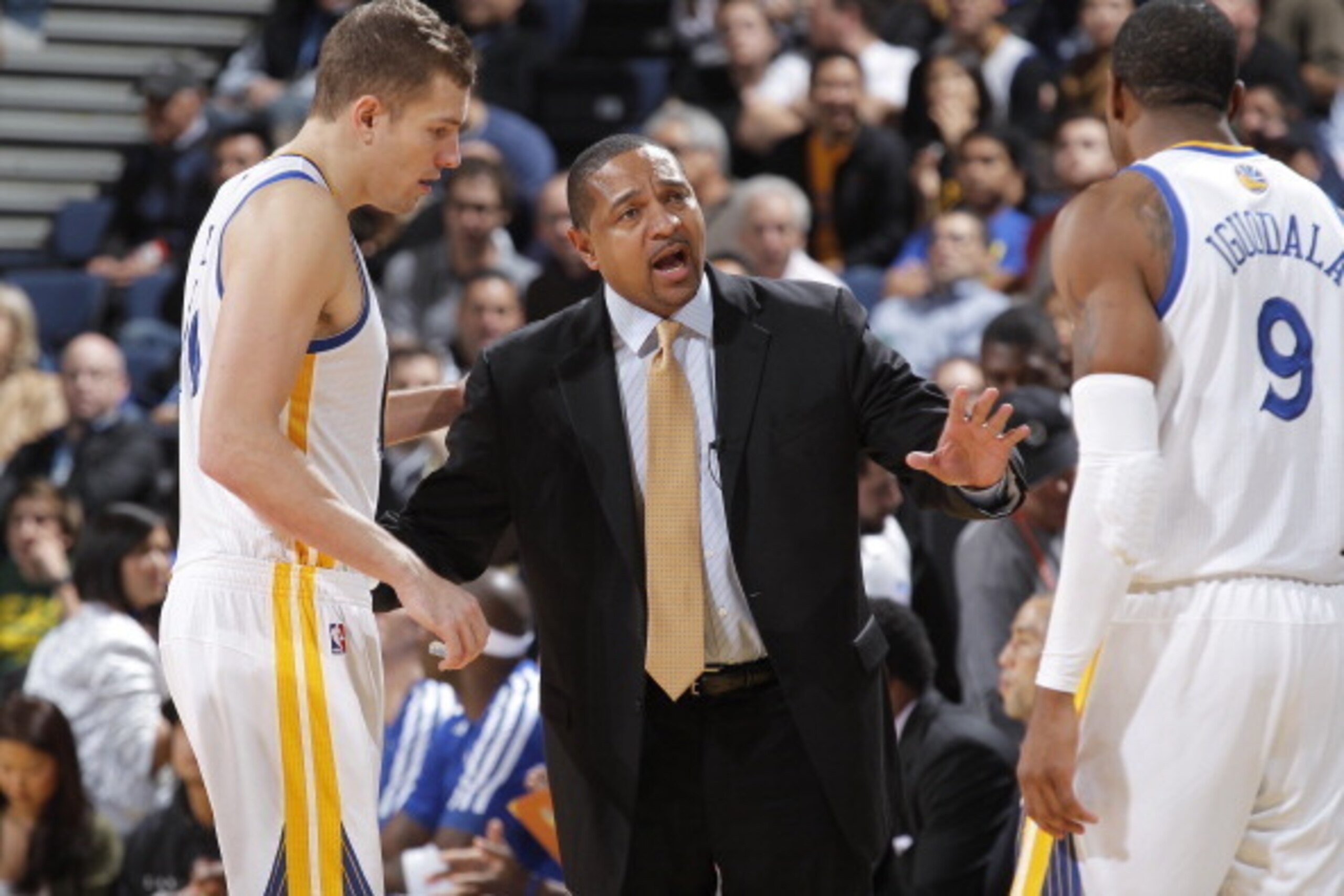 OAKLAND, CA - NOVEMBER 14: Head Coach Mark Jackson of the Golden State Warriors coaches his players David Lee #10 and Andre Iguodala #9 against the Oklahoma City Thunder on November 14, 2013 at Oracle Arena in Oakland, California. NOTE TO USER: User expre