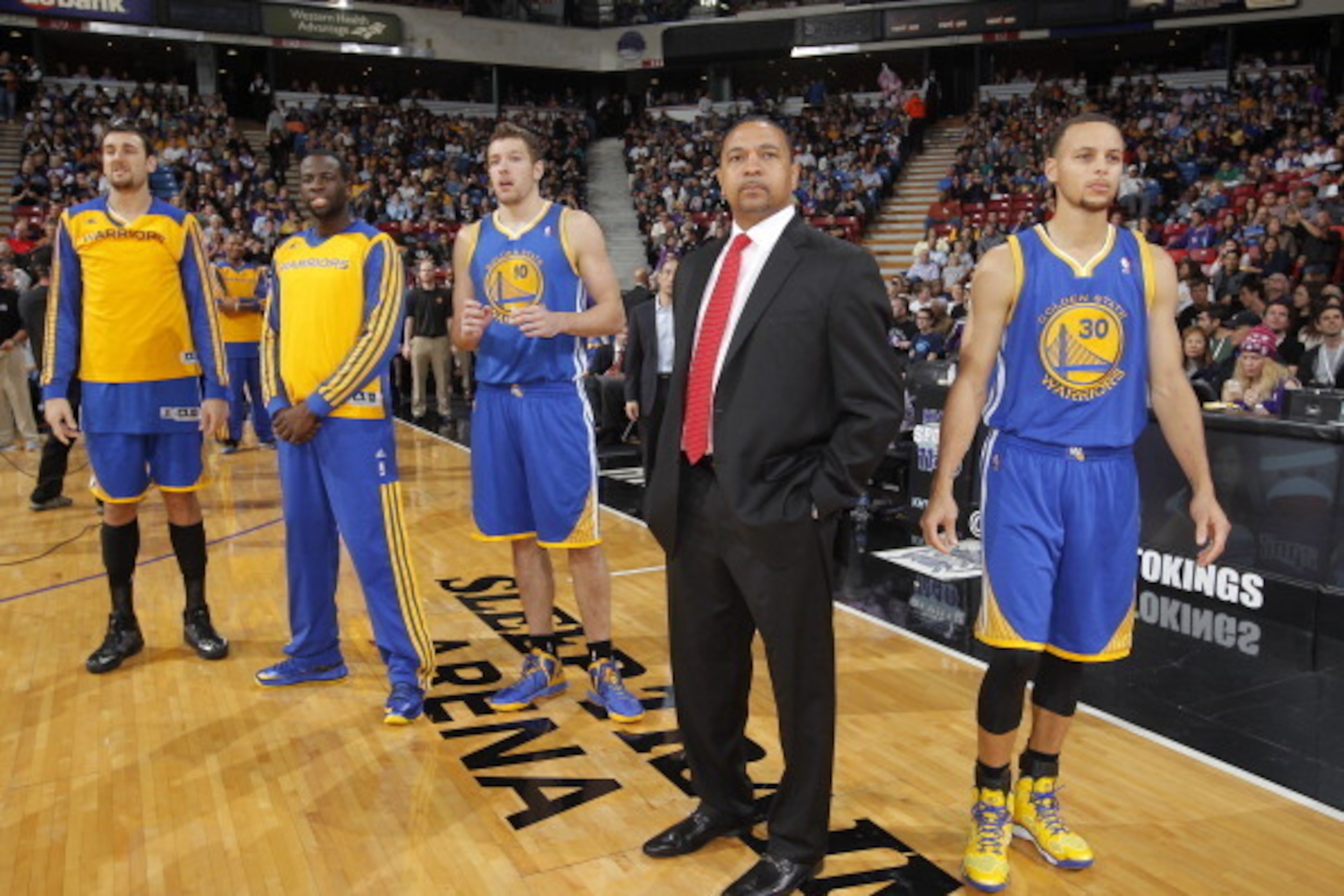 SACRAMENTO, CA - DECEMBER 1: Andrew Bogut #12, Draymond Green #23, David Lee #10, Head Coach Mark Jackson and Stephen Curry #30 of the Golden State Warriors during a break in play against the Sacramento Kings on December 1, 2013 at Sleep Train Arena in Sa