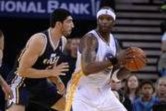 Apr 6, 2014; Oakland, CA, USA; Golden State Warriors center Jermaine O'Neal (7) controls the basketball against Utah Jazz center Enes Kanter (0) during the third quarter at Oracle Arena. The Warriors defeated the Jazz 130-102. Mandatory Credit: Kyle Terad
