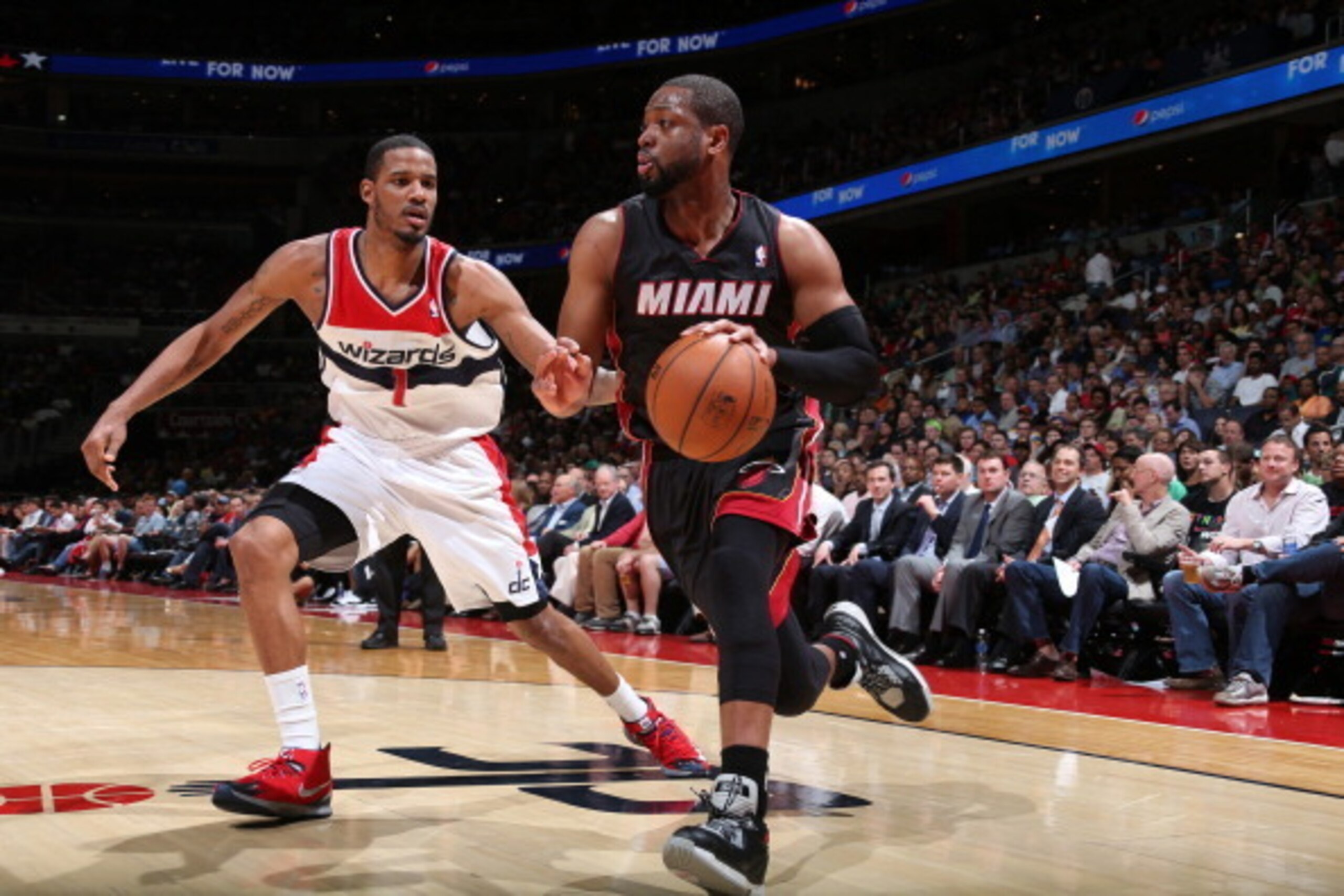 WASHINGTON, DC - APRIL 14: Dwyane Wade #3 of the Miami Heat drives against the Washington Wizards during the game at the Verizon Center on April 14, 2014 in Washington, DC. NOTE TO USER: User expressly acknowledges and agrees that, by downloading and or u