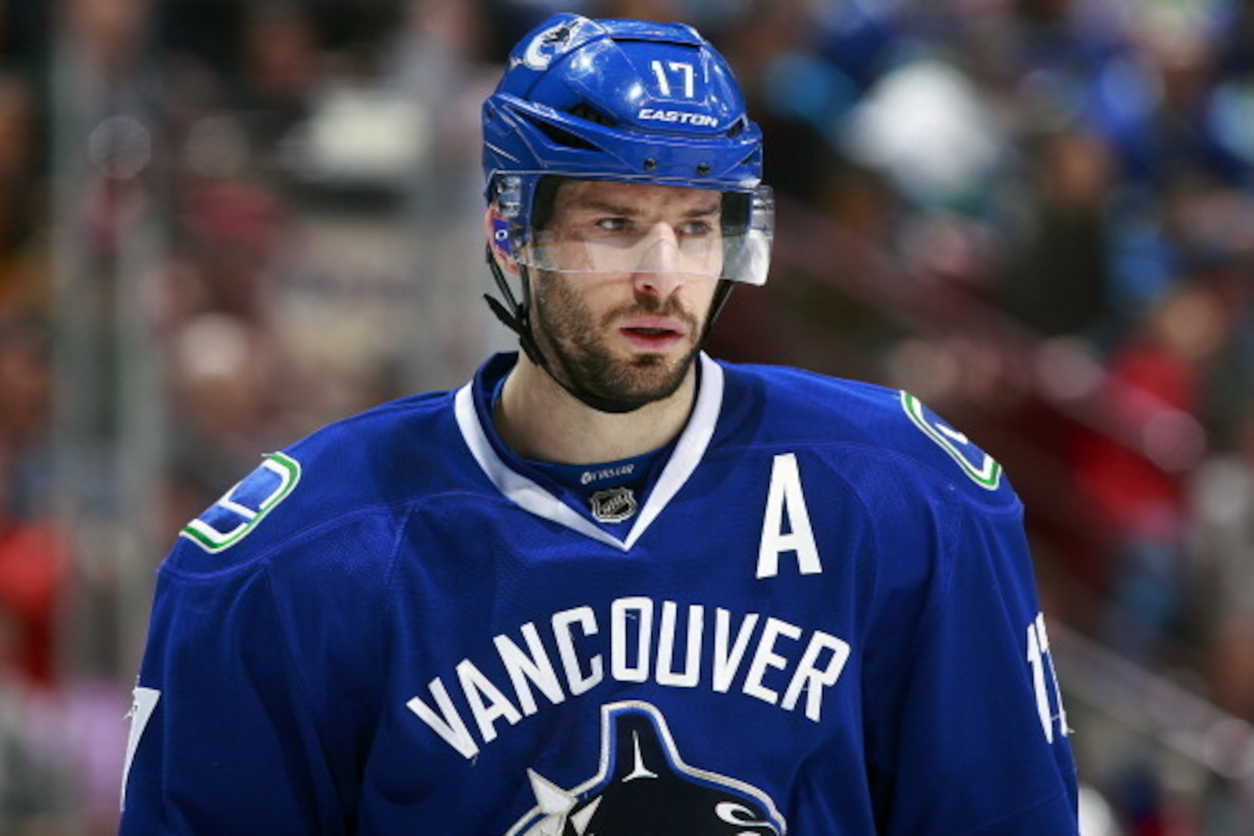 VANCOUVER, BC - APRIL 1:  Ryan Kesler #17 of the Vancouver Canucks looks on from the bench during their NHL game against the New York Rangers at Rogers Arena April 1, 2014 in Vancouver, British Columbia, Canada.  New York won 3-1. (Photo by Jeff Vinnick/N