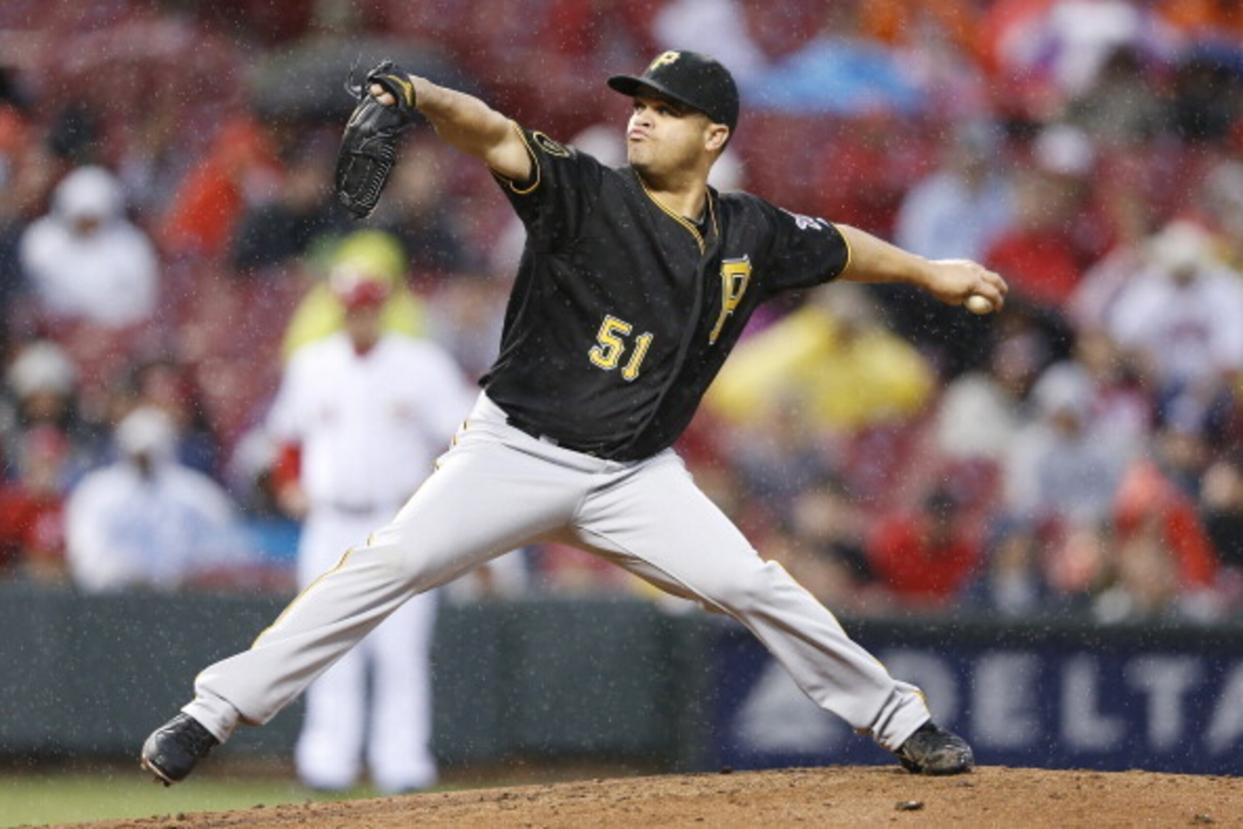 CINCINNATI, OH - APRIL 14: Wandy Rodriguez #51 of the Pittsburgh Pirates pitches in the second inning of the game against the Cincinnati Reds at Great American Ball Park on April 14, 2014 in Cincinnati, Ohio. (Photo by Joe Robbins/Getty Images)
