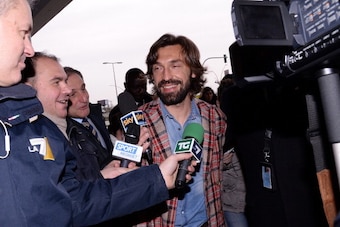 MILAN, ITALY - MARCH 03:  Andrea Pirlo of Italy arrives before the unveiling of the new Italy team kit at Malpensa Airport on March 3, 2014 in Milan, Italy.  (Photo by Claudio Villa/Getty Images)