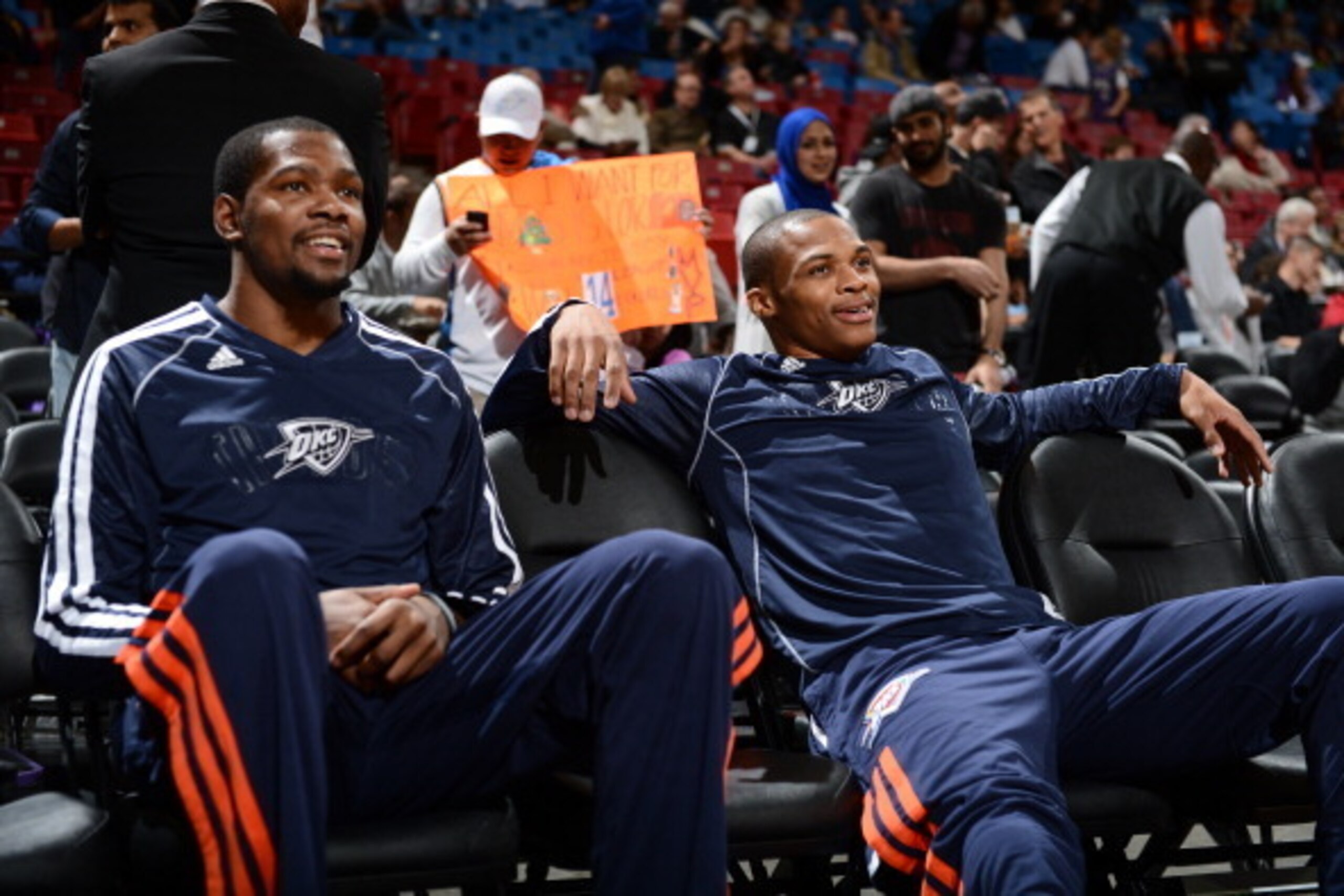 SACRAMENTO, CA - DECEMBER 3:  Kevin Durant #35 and Russell Westbrook #0 of the Oklahoma City Thunder share a laugh before the game the Sacramento Kings at Sleep Train Arena on December 3, 2013 in Sacramento, California. NOTE TO USER: User expressly acknow