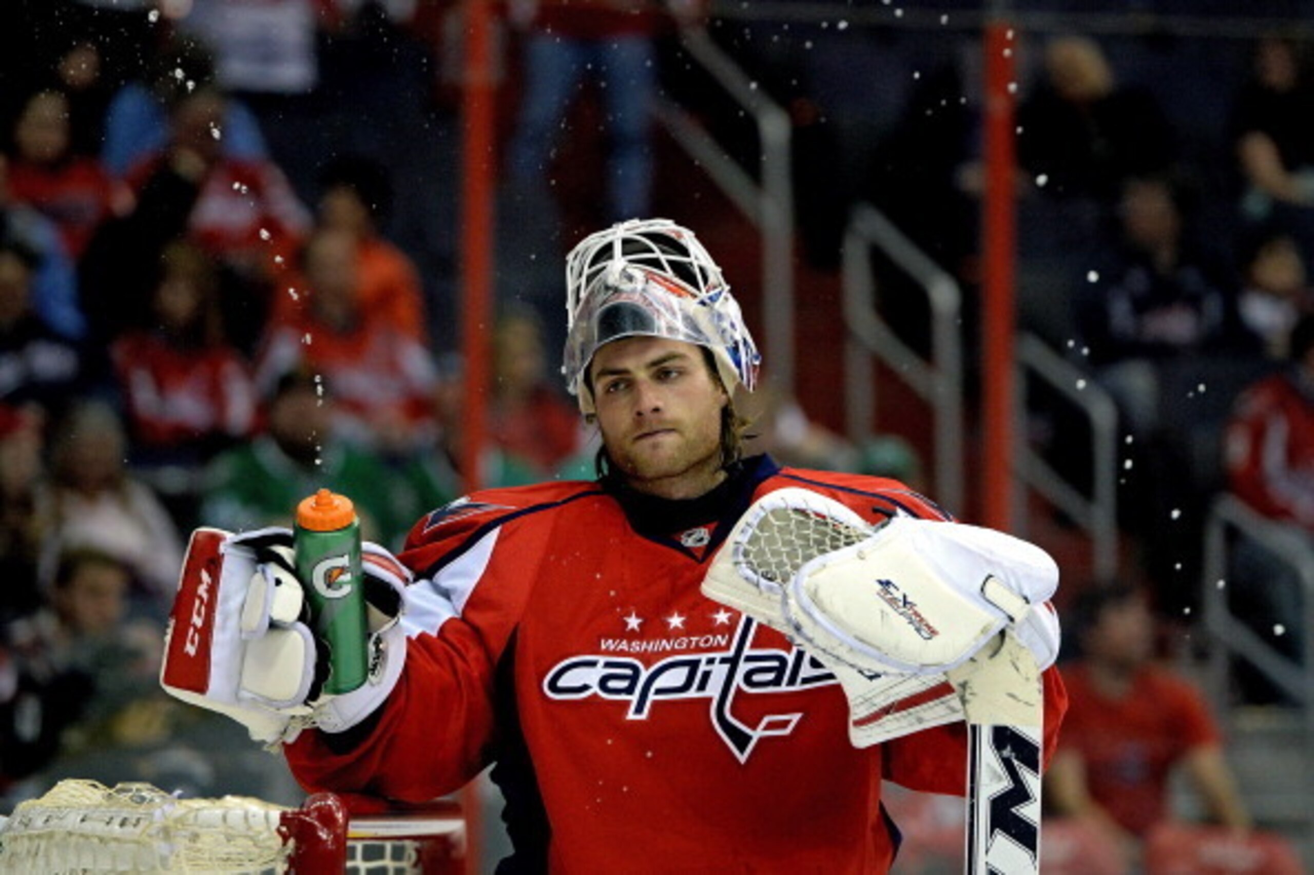 WASHINGTON, DC - APRIL 01: Braden Holtby #70 of the Washington Capitals reacts after giving up a shorthanded goal by Ryan Garbutt (not pictured) of the Dallas Stars in the third period during an NHL game at Verizon Center on April 1, 2014 in Washington, D