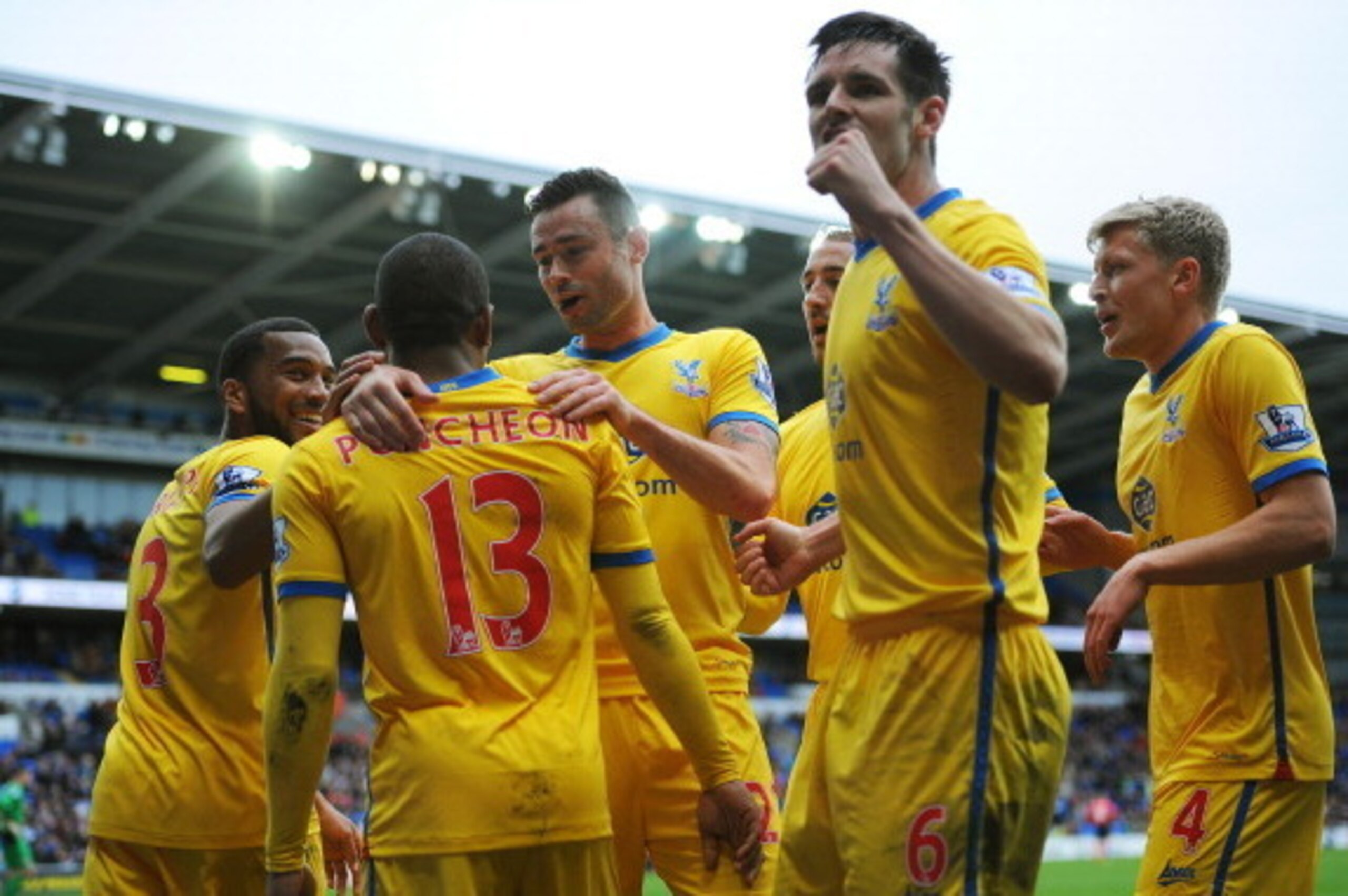 CARDIFF, WALES - APRIL 05:  Jason Puncheon #13 of Crystal Palace is congratulated by teammates after scoring his team's third goal during the Barclays Premier League match between Cardiff City and Crystal Palace at Cardiff City Stadium on April 5, 2014 in