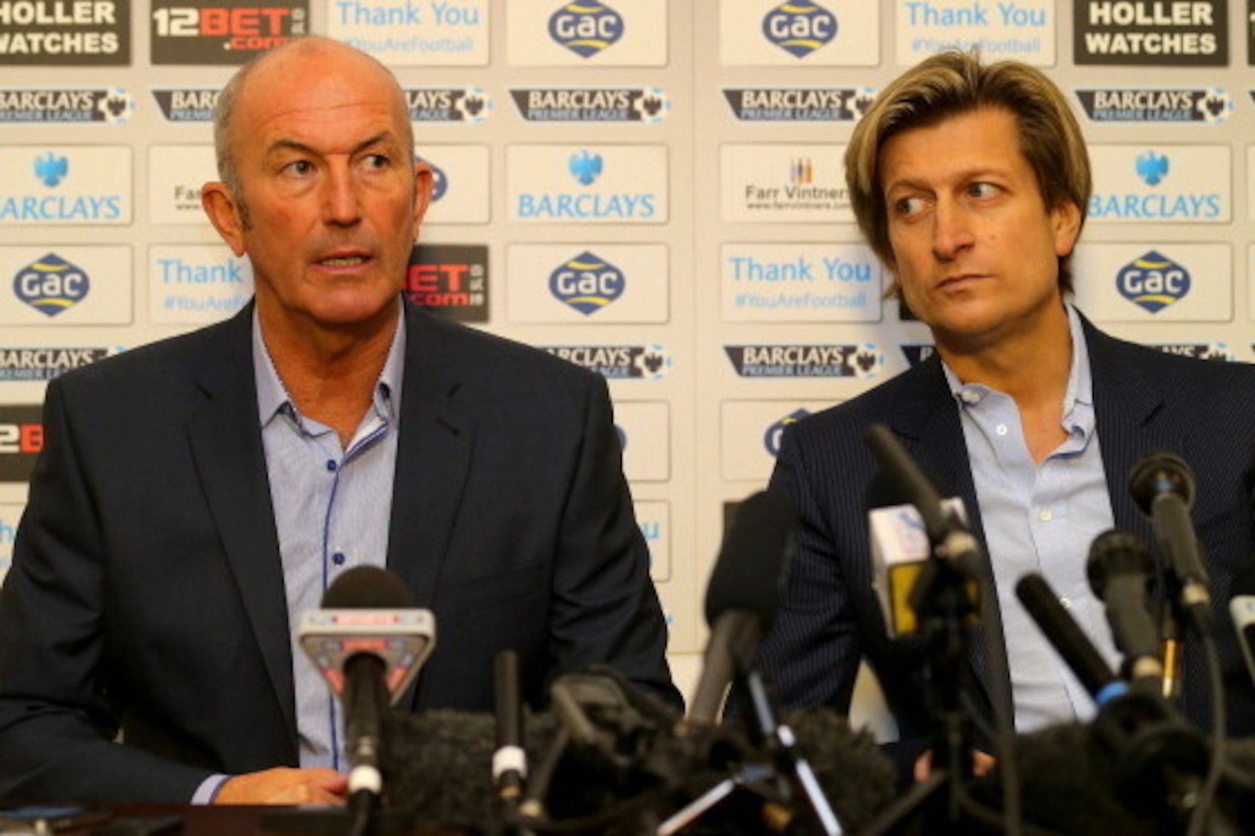 LONDON, ENGLAND - NOVEMBER 25:  Tony Pulis speaks as Chairman Steve Parish looks on during a press conference after being unveiled as the new Crystal Palace Manager on November 25, 2013 in London, England.  (Photo by Clive Rose/Getty Images)
