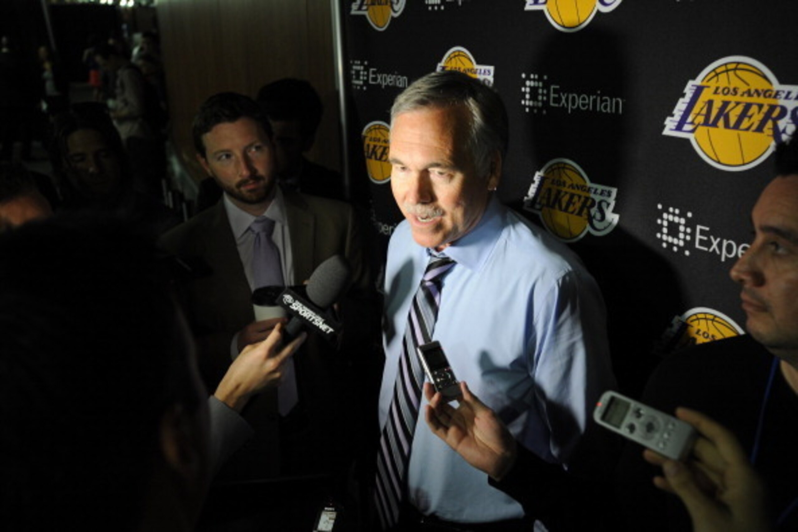 LOS ANGELES, CA - APRIL 6:  Mike D'Antoni of the Los Angeles Lakers answers questions after the game against the Los Angeles Clippers at Staples Center on April 6, 2014 in Los Angeles, California. NOTE TO USER: User expressly acknowledges and agrees that,