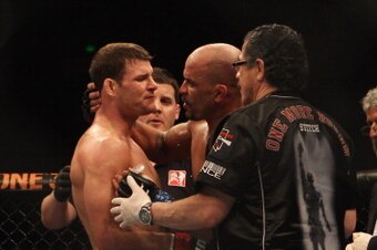 SYDNEY, AUSTRALIA - FEBRUARY 27:  Michael Bisping of Great Britain speaks to Jorge Rivera of the USA after winning their middleweight bout part of at UFC 127 at Acer Arena on February 27, 2011 in Sydney, Australia.  (Photo by Mark Kolbe/Getty Images)