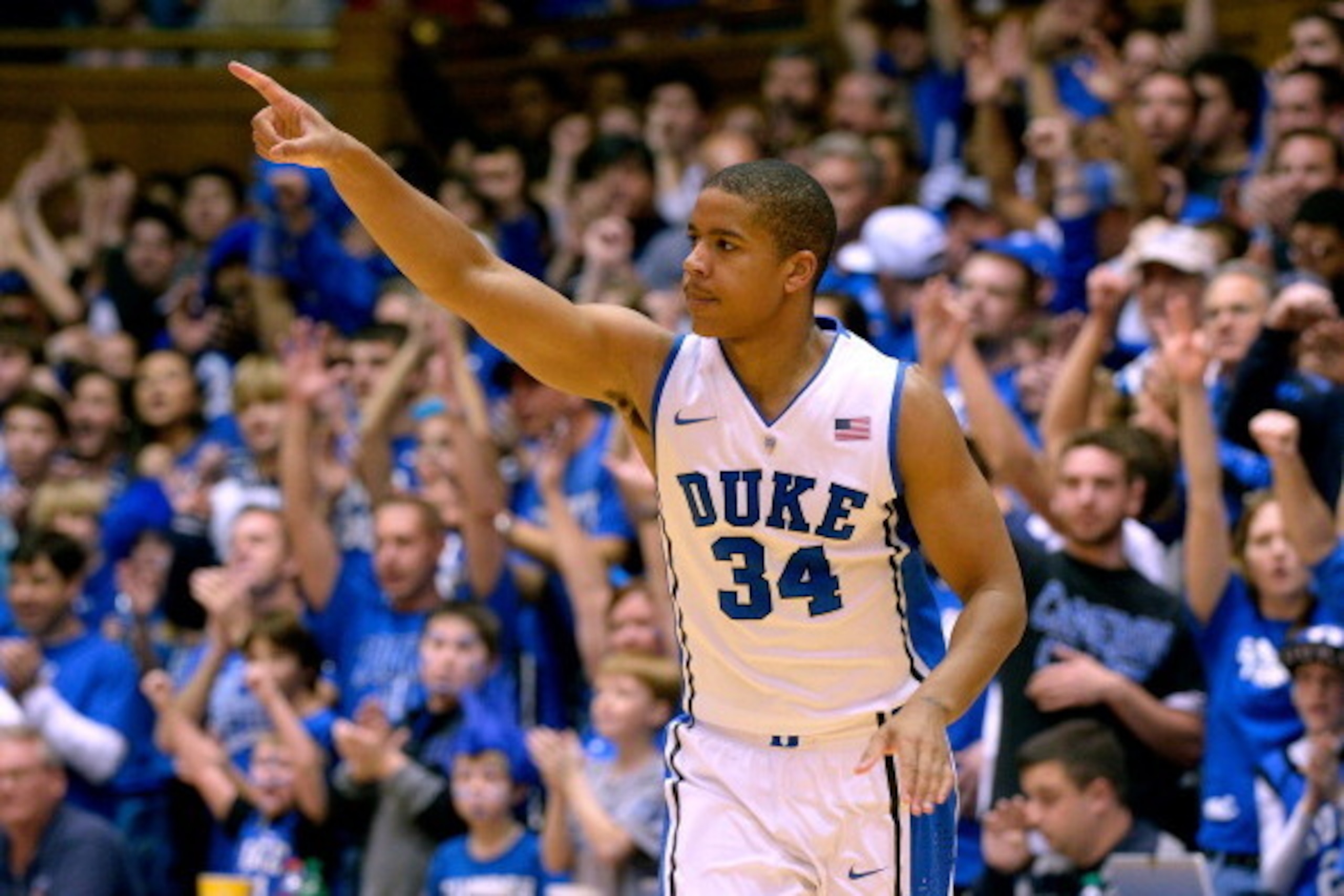 DURHAM, NC - DECEMBER 28:  Andre Dawkins #34 of the Duke Blue Devils reacts after making a three-point basket against the Eastern Michigan Eagles during their game at Cameron Indoor Stadium on December 28, 2013 in Durham, North Carolina. Duke won 82-59.  