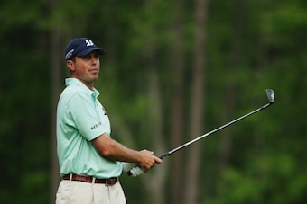 AUGUSTA, GA - APRIL 13:  Matt Kuchar of the United States watches his tee shot on the 12th hole  during the final round of the 2014 Masters Tournament at Augusta National Golf Club on April 13, 2014 in Augusta, Georgia.  (Photo by Andrew Redington/Getty I