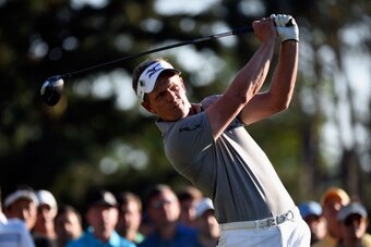 AUGUSTA, GA - APRIL 10:  Luke Donald of England hits a tee shot on the 18th hole during the first round of the 2014 Masters Tournament at Augusta National Golf Club on April 10, 2014 in Augusta, Georgia.  (Photo by Harry How/Getty Images)