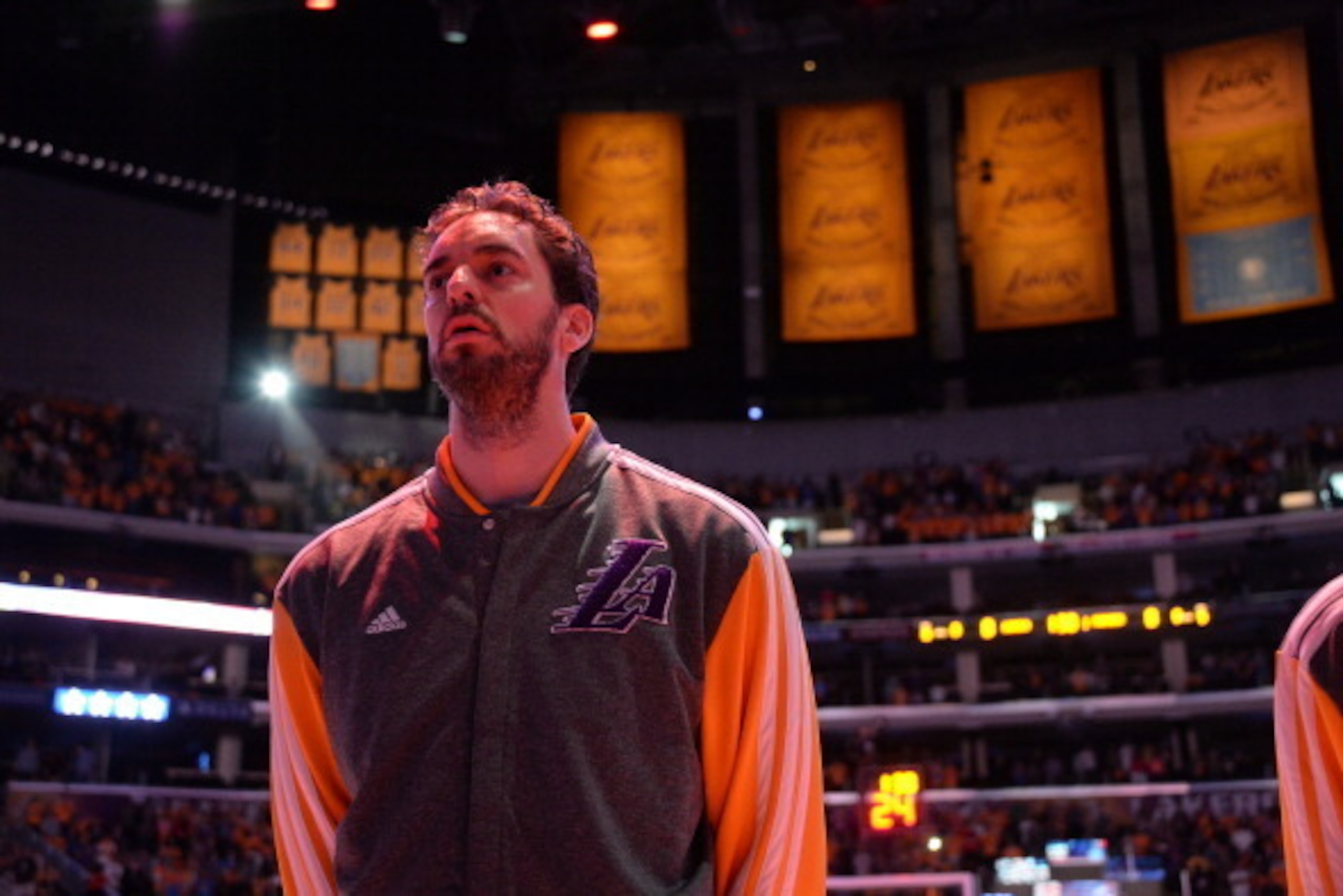 LOS ANGELES, CA - MARCH 9: Pau Gasol #16 of the Los Angeles Lakers stands in observance of the national anthem before a game against the Oklahoma City Thunder at STAPLES Center on March 9, 2014 in Los Angeles, California. NOTE TO USER: User expressly ackn