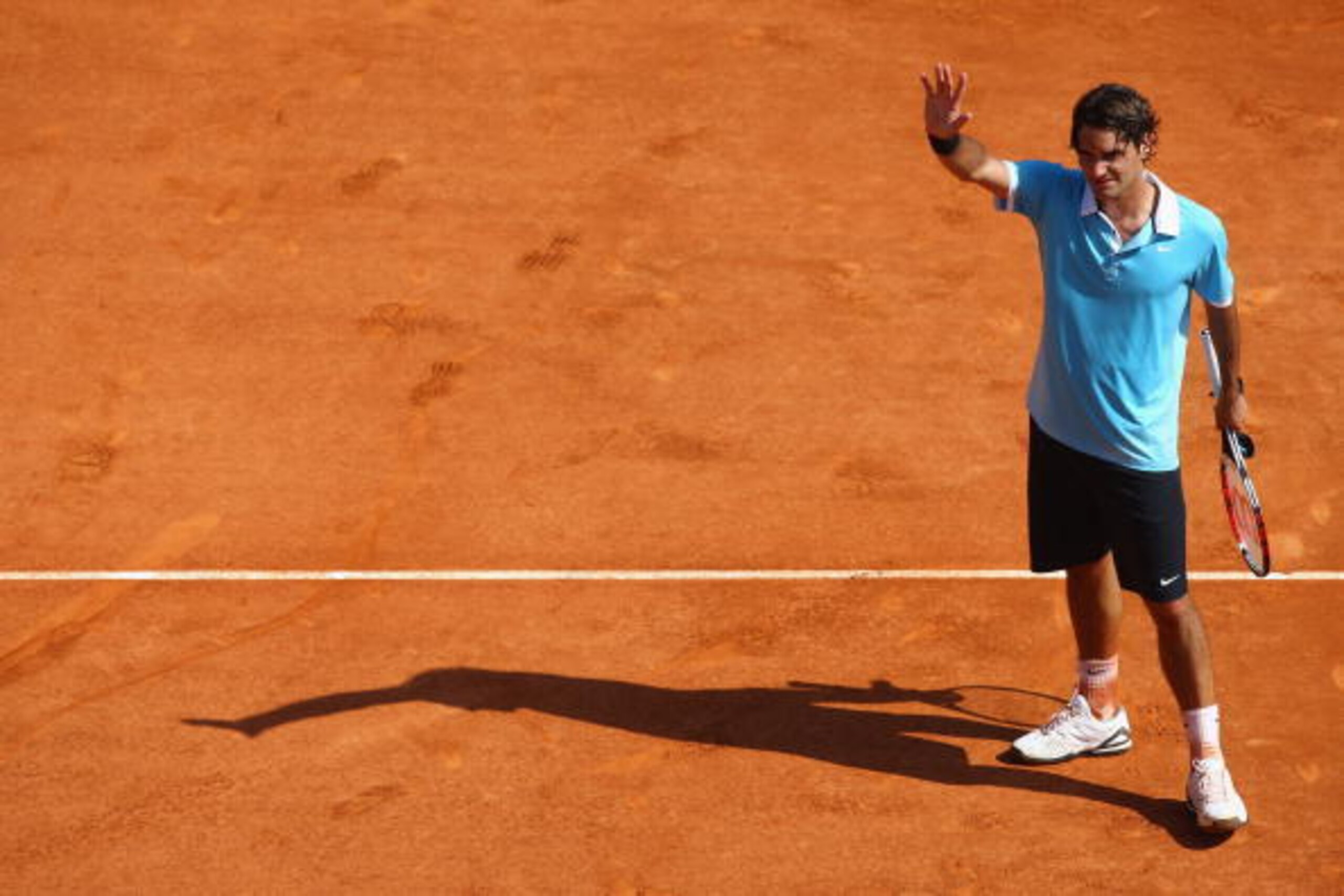 MONTE CARLO, MONACO - APRIL 25:  Roger Federer of Switzerland celebrates match point after his 5-7,6-2,6-2 victory during his quarter final match against David Nalbandian of Argentina on day seven of the Masters Series at the Monte Carlo Country Club, Apr