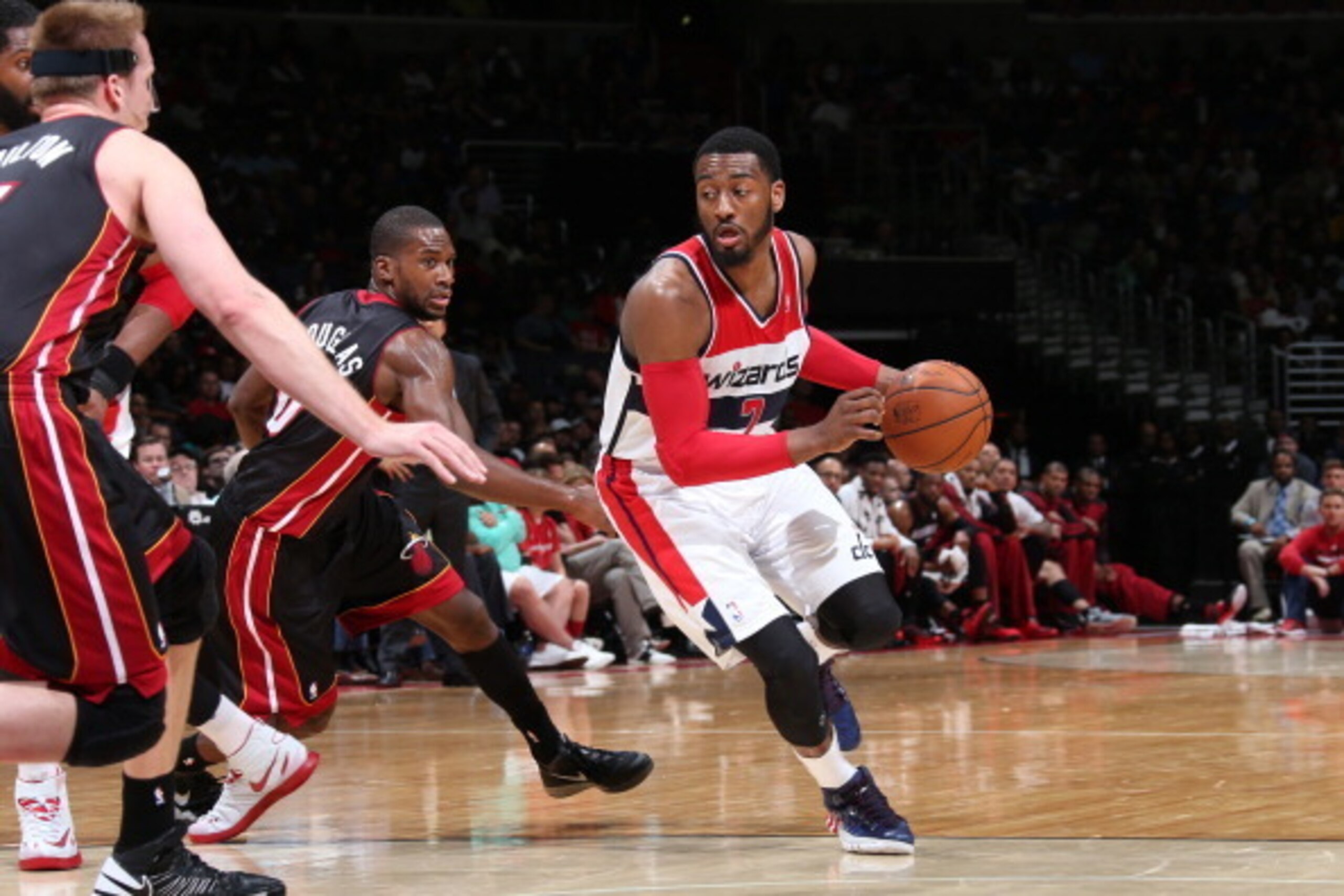 WASHINGTON, DC - APRIL 14: John Wall #2 of the Washington Wizards handles the ball against the Miami Heat during the game at the Verizon Center on April 14, 2014 in Washington, DC. NOTE TO USER: User expressly acknowledges and agrees that, by downloading 
