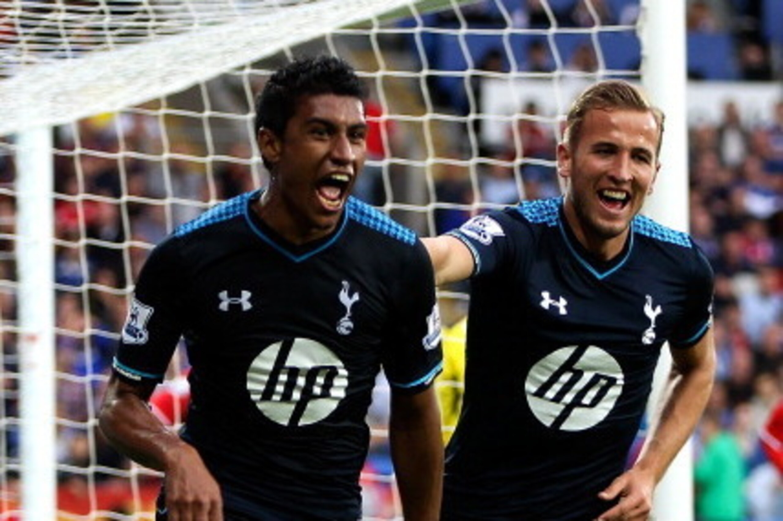 CARDIFF, WALES - SEPTEMBER 22:  Paulinho of Tottenham celebrates after scoring the winning goal during the Barclays Premier League match between Cardiff City and Tottenham Hotspur at Cardiff City Stadium on September 22, 2013 in Cardiff, Wales.  (Photo by