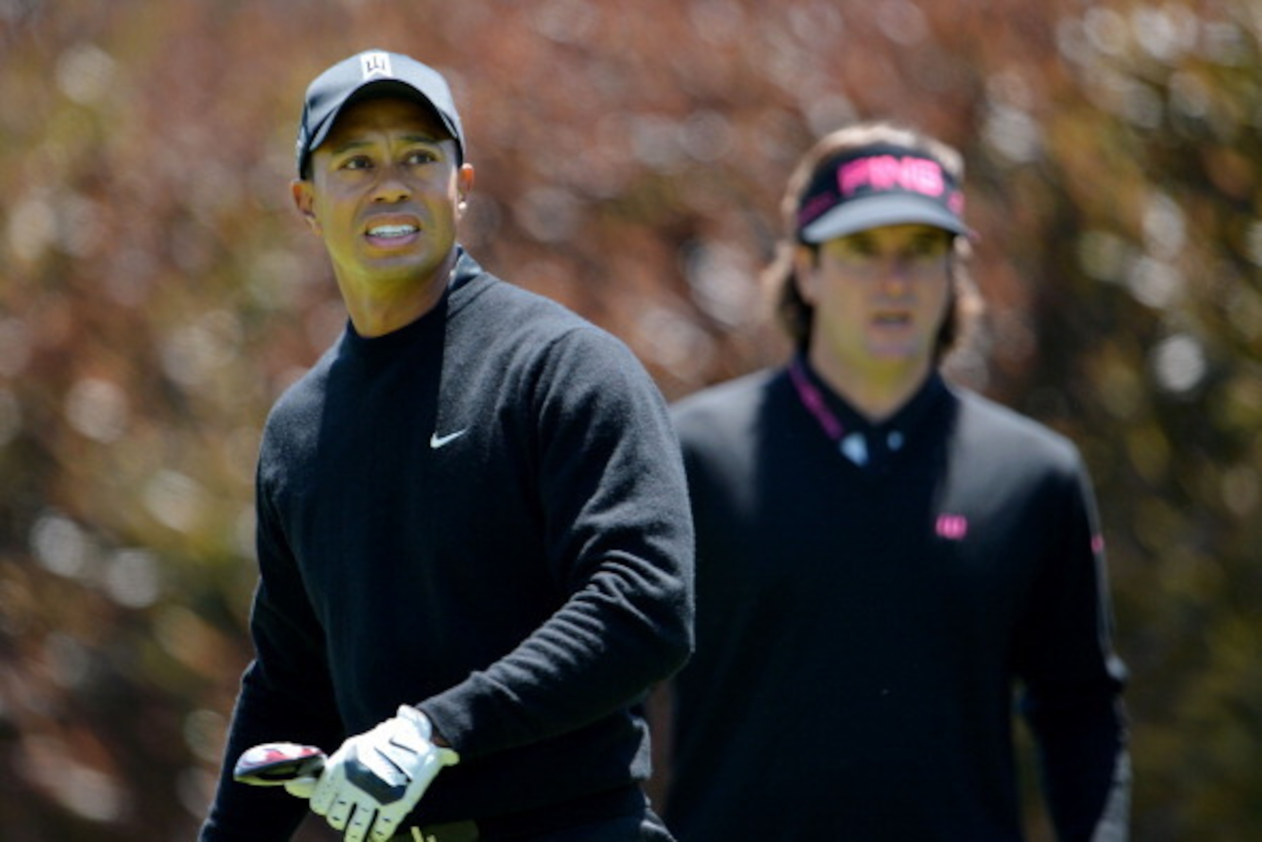 SAN FRANCISCO, CA - JUNE 15:  Tiger Woods (L) and Bubba Watson (R) of the United States wait on the first tee during the second round of the 112th U.S. Open at The Olympic Club on June 15, 2012 in San Francisco, California.  (Photo by Stuart Franklin/Gett