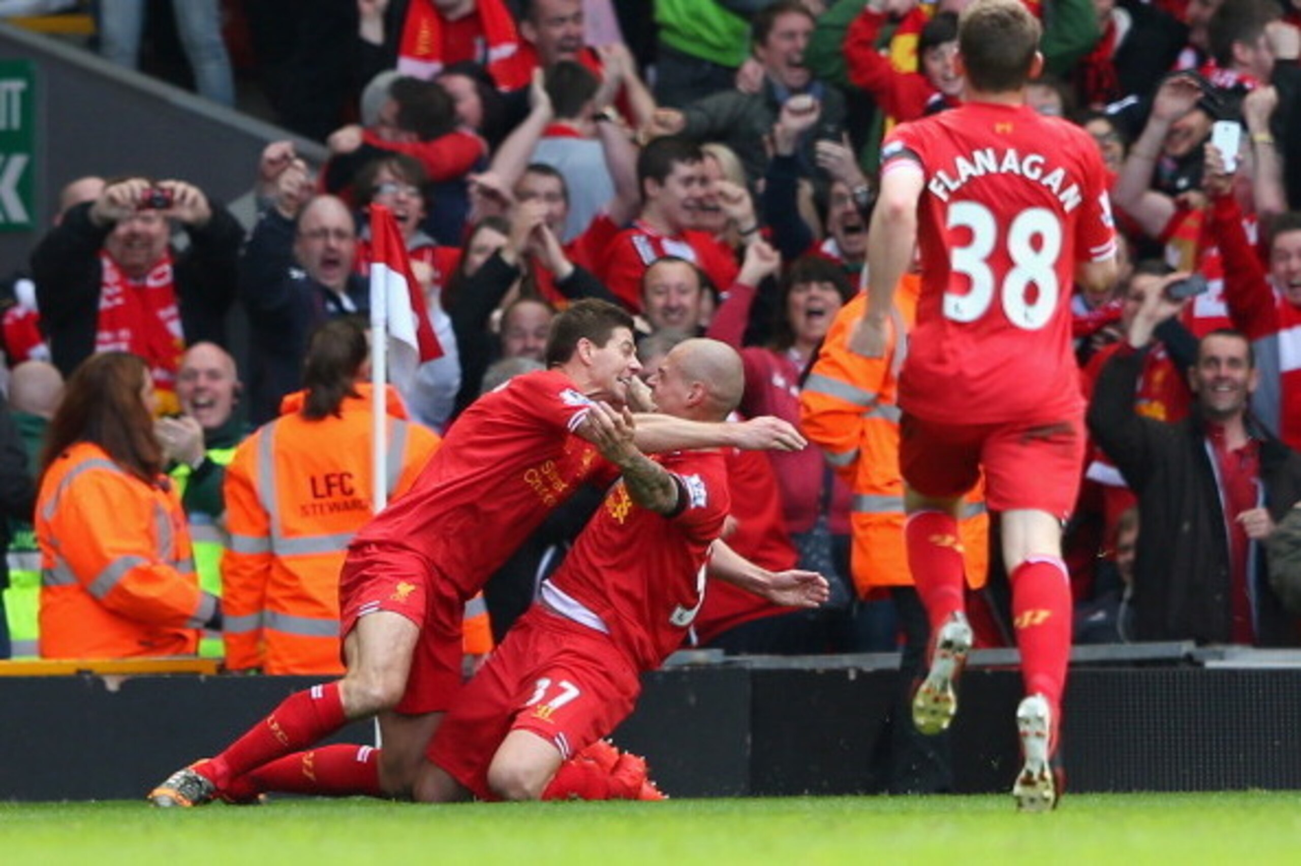 LIVERPOOL, ENGLAND - APRIL 13:  Martin Skrtel of Liverpool celebrates scoring the second goal with team-mate Steven Gerrard (L) during the Barclays Premier League match between Liverpool and Manchester City at Anfield on April 13, 2014 in Liverpool, Engla