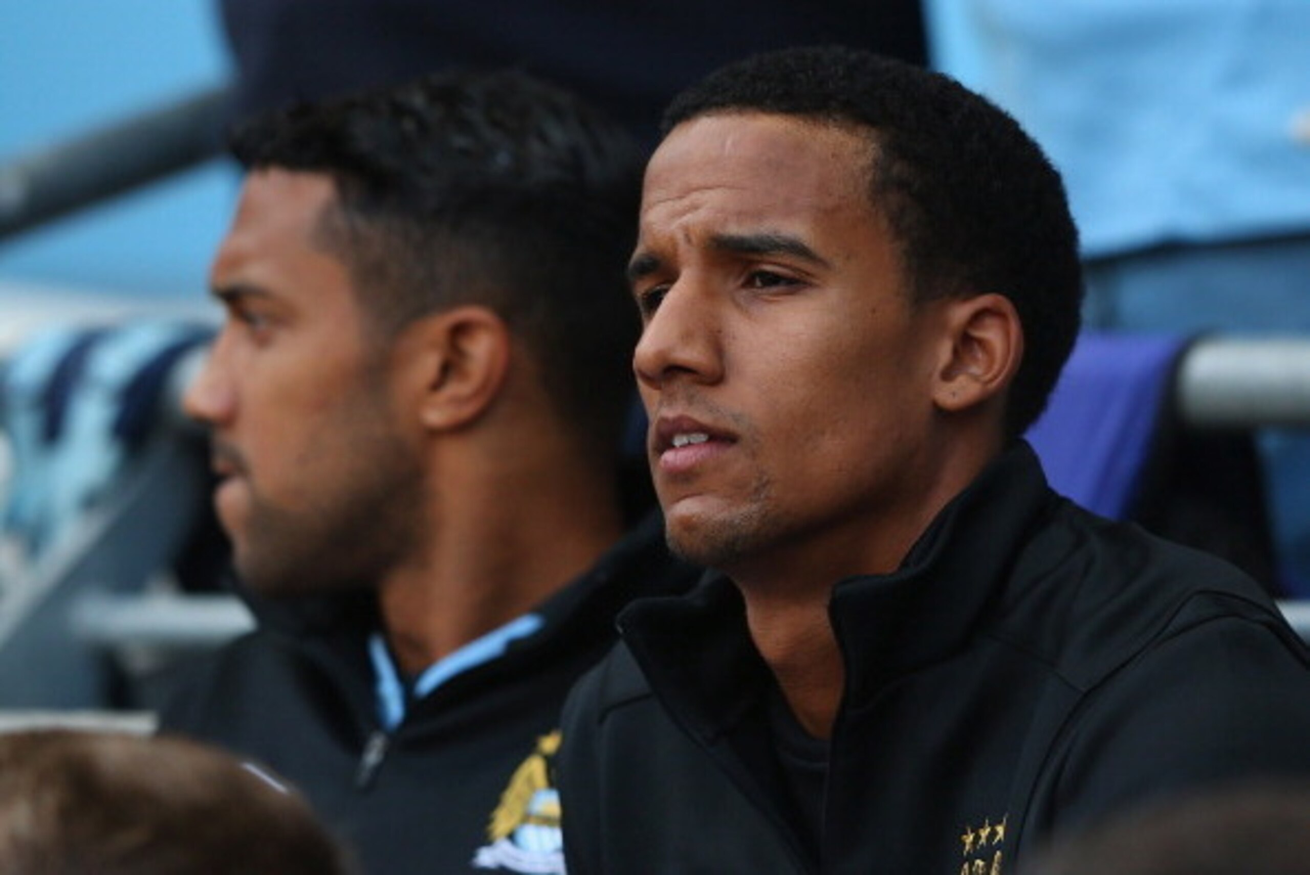 MANCHESTER, ENGLAND - SEPTEMBER 01:  New signing Scott Sinclair of Manchester City watches from the bench during the Barclays Premier League match between Manchester City and Queens Park Rangers at Etihad Stadium on September 1, 2012 in Manchester, Englan