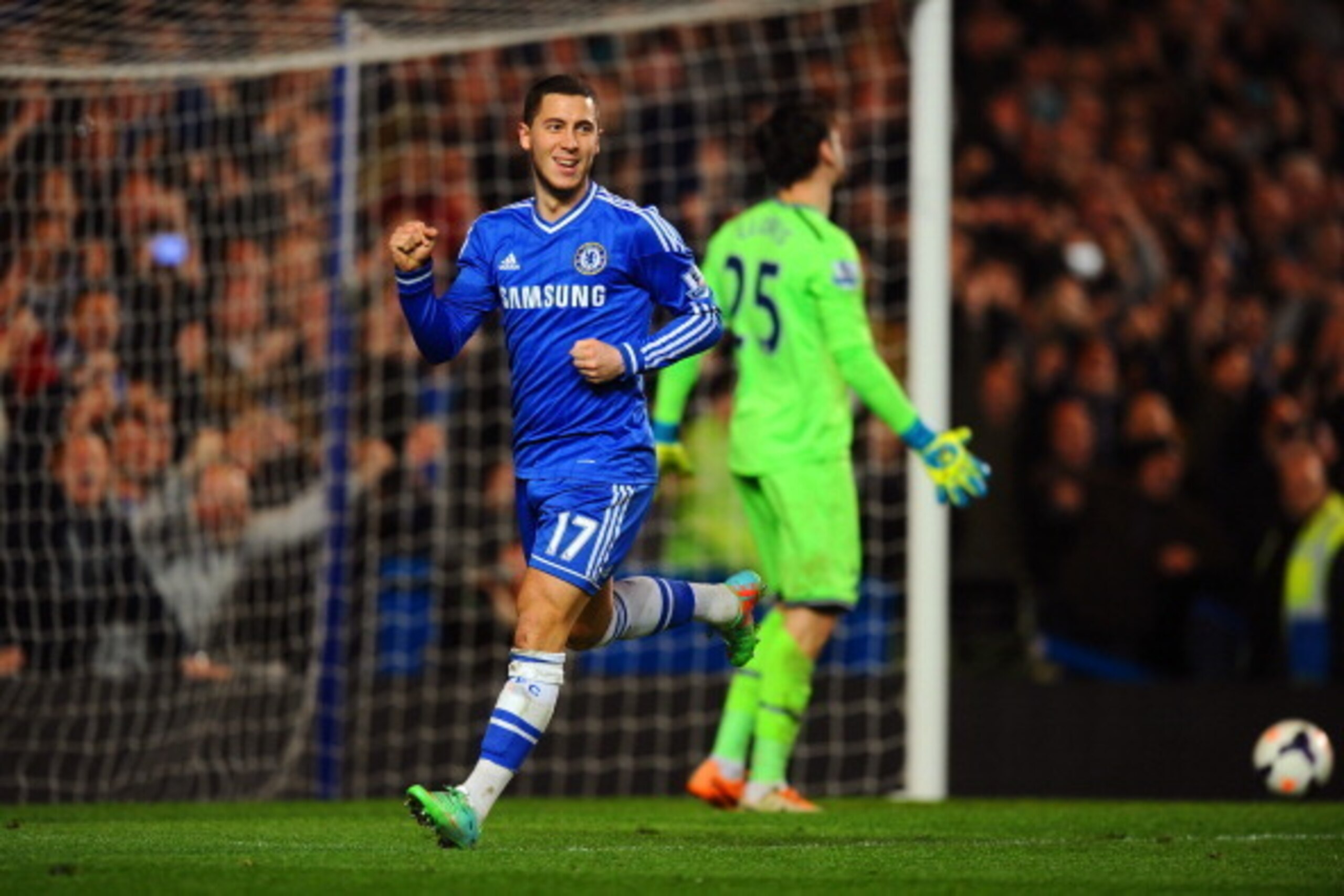 LONDON, ENGLAND - MARCH 08:  Eden Hazard of Chelsea celebrates after scoring his team's second goal from the penalty spot past goalkeeper Hugo Lloris of Spurs during the Barclays Premier League match between Chelsea and Tottenham Hotspur at Stamford Bridg