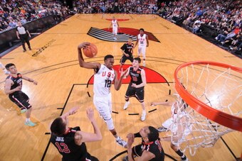PORTLAND, OR - APRIL 12:  Myles Turner #12 of Team USA grabs a rebound against the World Team on April 12, 2014 at the Moda Center Arena in Portland, Oregon. NOTE TO USER: User expressly acknowledges and agrees that, by downloading and or using this photo