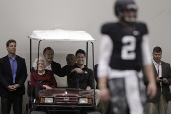 George and Barbara Bush arrive for Johnny Manziel's pro day at Texas A&M.