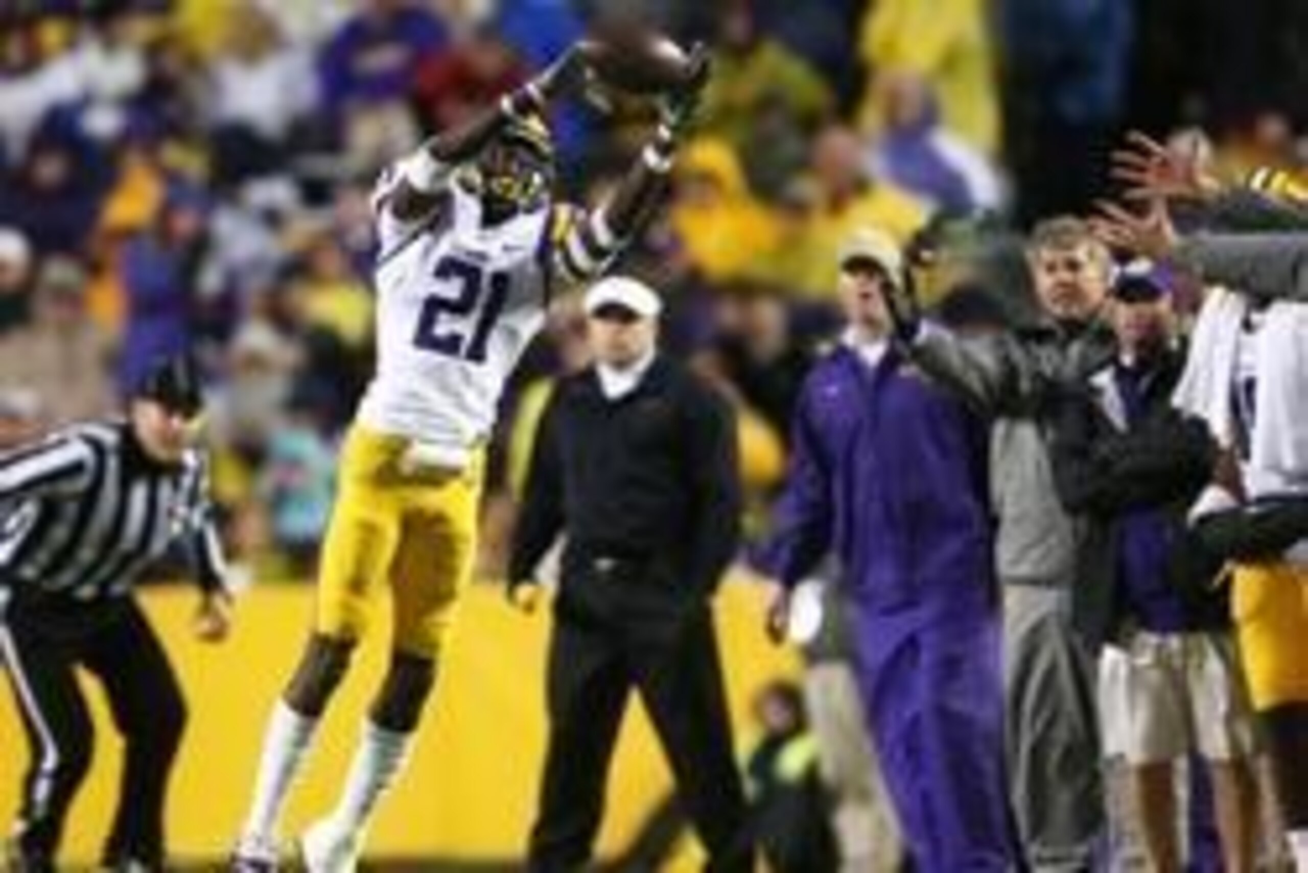 Nov 23, 2013; Baton Rouge, LA, USA; LSU Tigers defensive back Rashard Robinson (21) catches the ball for an interception against the Texas A&M Aggies in the second half at Tiger Stadium. LSU defeated Texas A&M 34-10. Mandatory Credit: Crystal LoGiudice-US