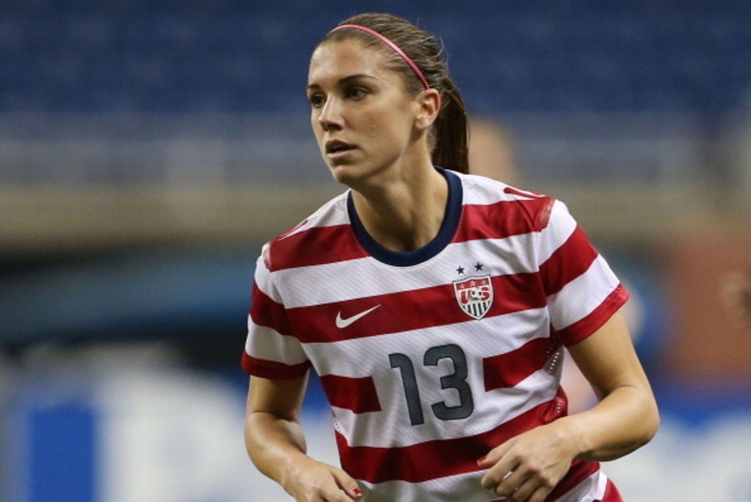 DETROIT, MI - DECEMBER 08:  Alex Morgan #13 of Team USA looks for the pass during the game against China at Ford Field on December 8, 2012 in Detroit, Michigan. USA defeated China 2-0.  (Photo by Leon Halip/Getty Images)