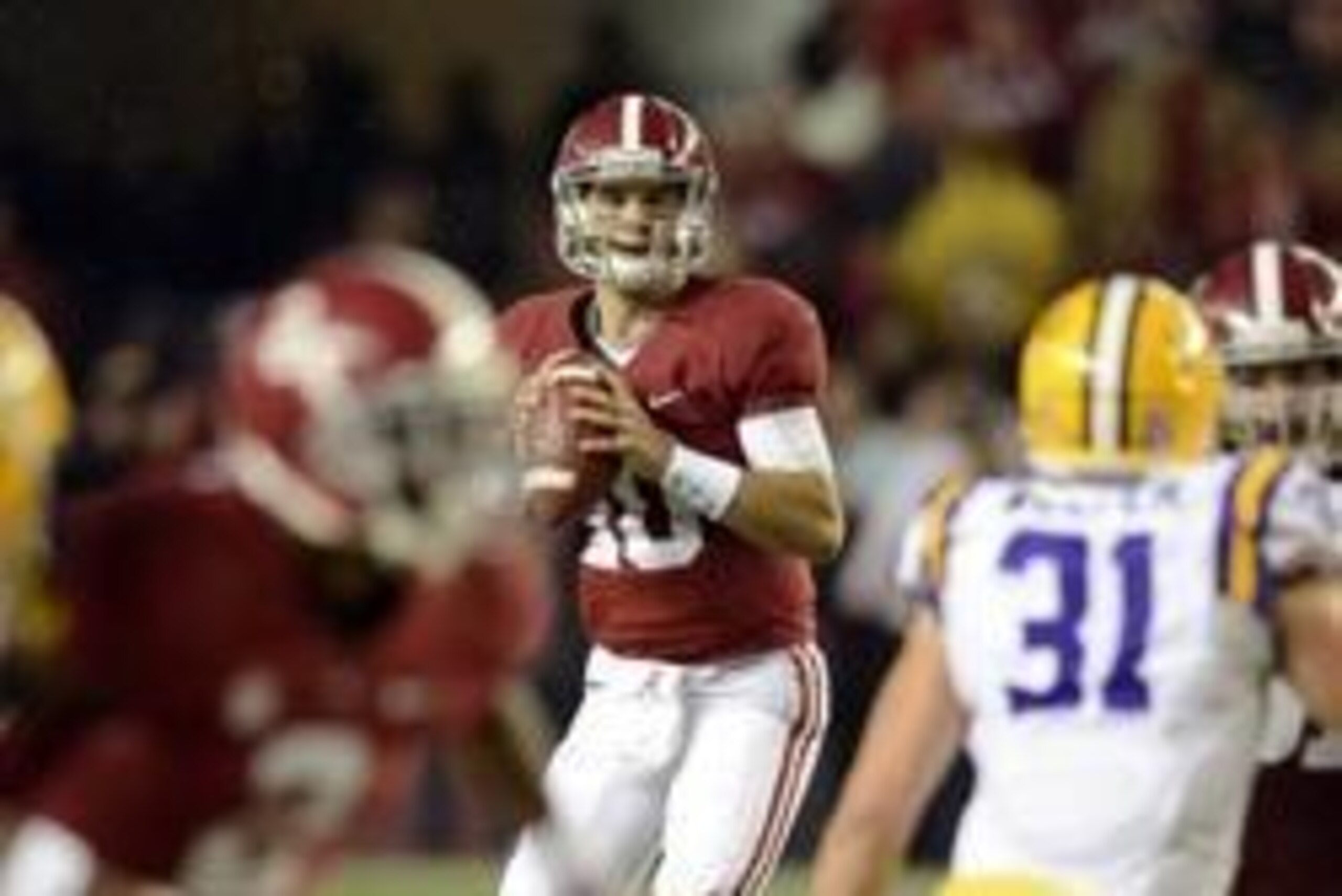 Nov 9, 2013; Tuscaloosa, AL, USA; Alabama Crimson Tide quarterback AJ McCarron (10) looks to throw the ball against the LSU Tigers during the third quarter at Bryant-Denny Stadium. Alabama defeated LSU 38-17. Mandatory Credit: John David Mercer-USA TODAY 