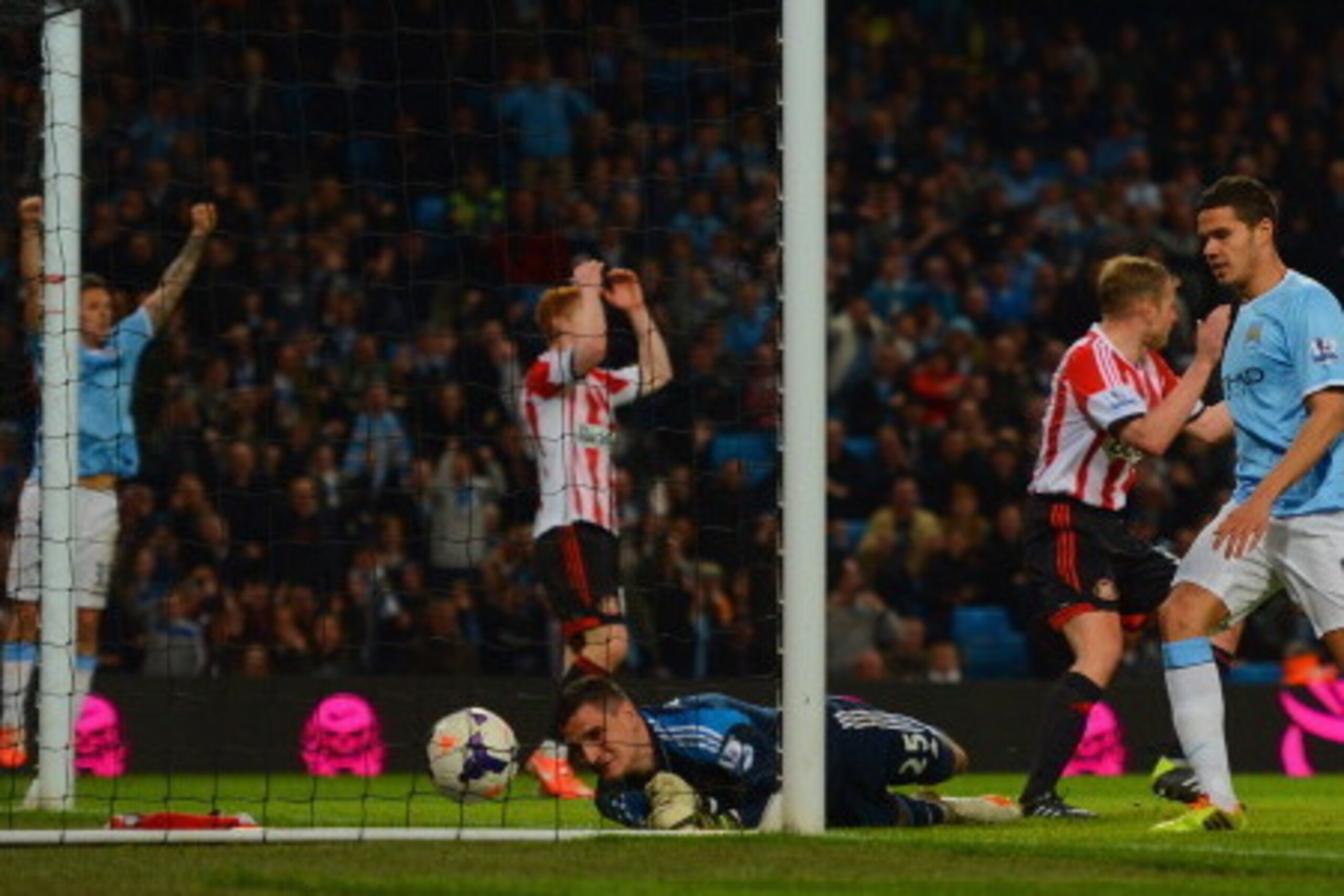 MANCHESTER, ENGLAND - APRIL 16:  Sunderland players react as Samir Nasri of Manchester City (not pictured) effort on goal goes past Vito Mannone of Sunderland during the Barclays Premier League match between Manchester City and Sunderland at Etihad Stadiu