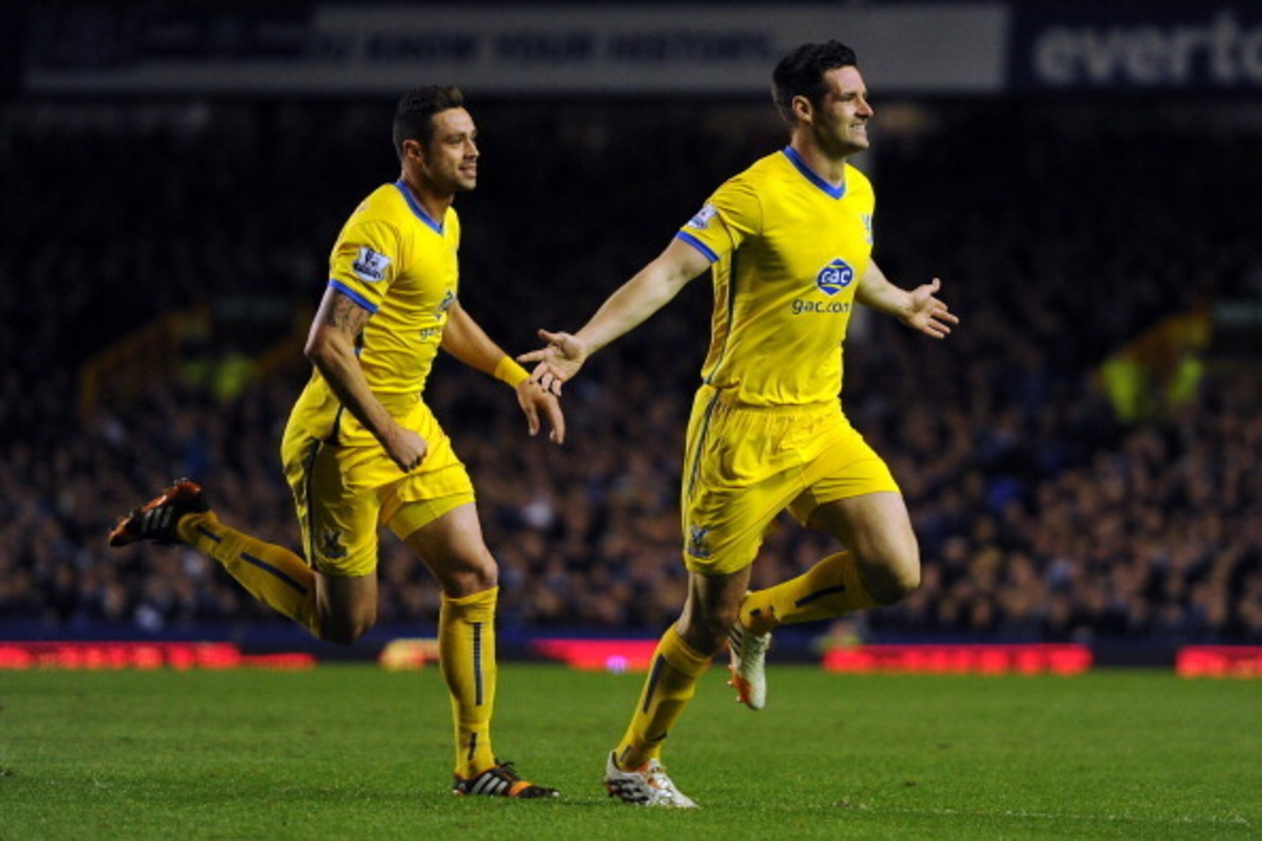 LIVERPOOL, ENGLAND - APRIL 16: Scott Dann of Crystal Palace celebrates scoring his side's second goal during the Barclays Premier League match between Everton and Crystal Palace at Goodison Park on April 16, 2014 in Liverpool, England. (Photo by Chris Bru